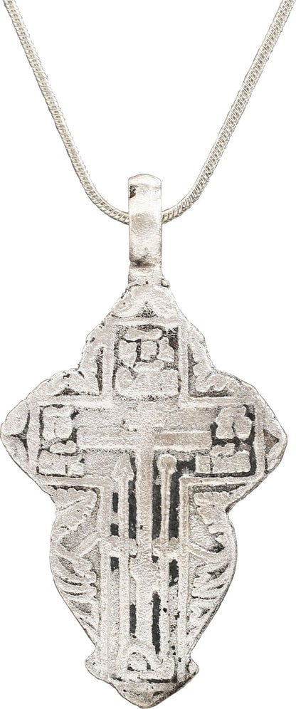 EASTERN EUROPEAN CHRISTIAN CROSS NECKLACE: Title: EASTERN EUROPEAN CHRISTIAN CROSS NECKLACE Description: 17th-18th Century, Orthodox rite. Silvered bronze. Over 2” total height. Raised border delineating the cross with broad beams, the c
