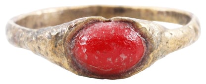 MEDIEVAL EUROPEAN RING, 13TH-14TH CENTURY AD, SIZE 7 1/2: Title: MEDIEVAL EUROPEAN RING, 13TH-14TH CENTURY AD, SIZE 7 1/2 Description: Late Medieval/Renaissance Period. Size 7 1/2 with 2.2mm rounded face band (age textured). Oval bezel securing the red ̶