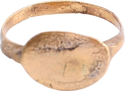 MEDIEVAL EUROPEAN RING, SIZE 9: Title: MEDIEVAL EUROPEAN RING, SIZE 9 Description: Fifth to eighth century AD, pre-Viking. Gilt bronze, size 9 with rounded face band, 2.5mm. Raised crested shoulders and oval bezel, probably for the 