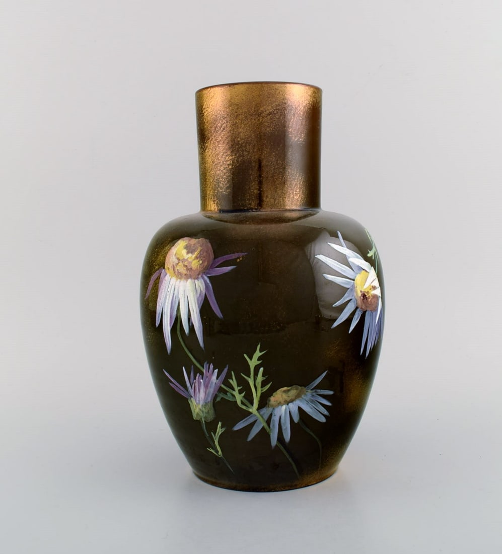 Clément Massier for Golfe Juan. Antique vase in glazed ceramics. Beautiful luster glaze with: Brand: Various Clément Massier for Golfe Juan. Antique vase in glazed ceramics. Beautiful luster glaze with hand-painted flowers. Late 19th century. Measures: 27.5 x 18 cm. In excellent