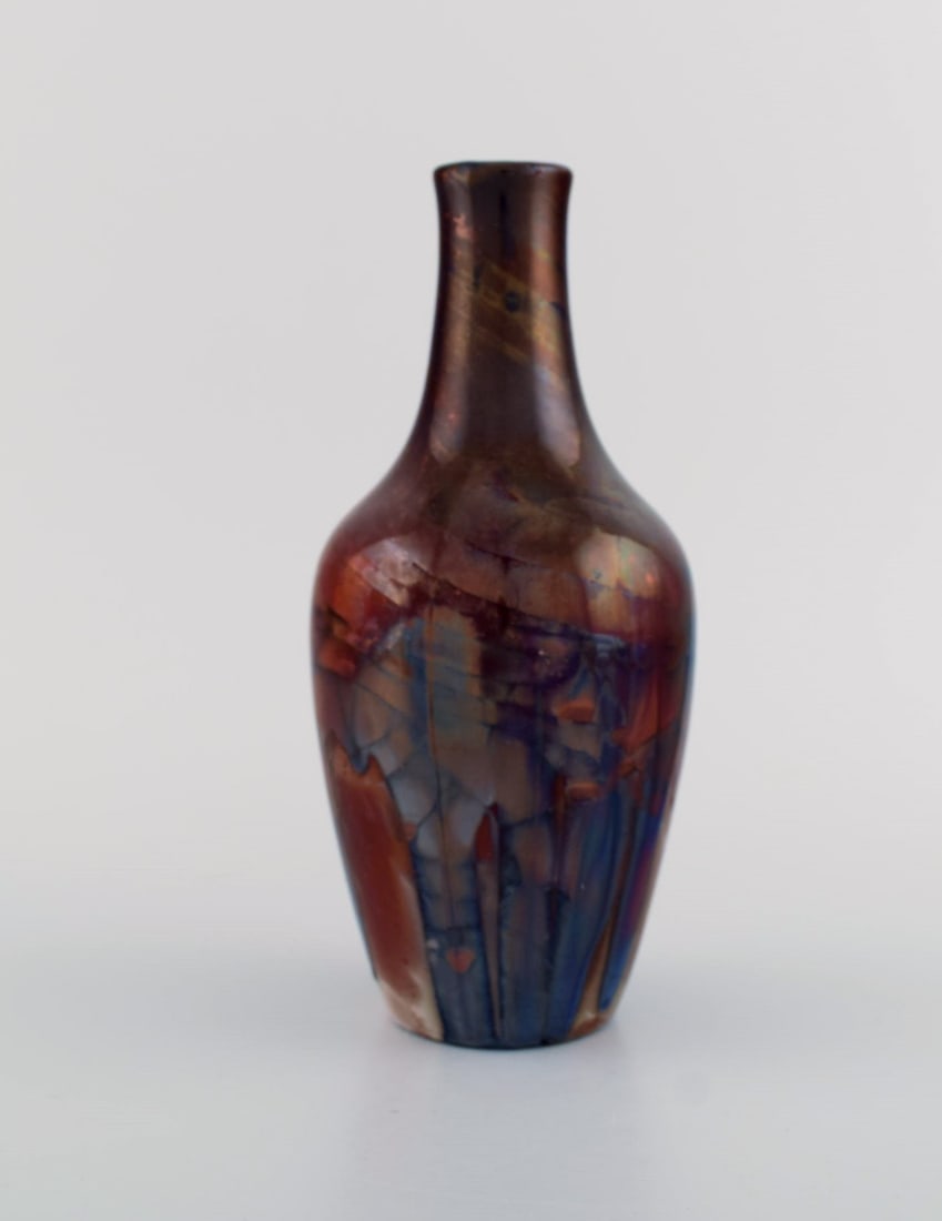 Karl Hansen Reistrup for Kähler. Antique vase in glazed ceramics. Beautiful luster glaze.: Brand: Kähler Karl Hansen Reistrup for Kähler. Antique vase in glazed ceramics. Beautiful luster glaze. 1890s. Measures: 21 x 9.5 cm. In excellent condition. Signed: HAK. Reserve: $448.00