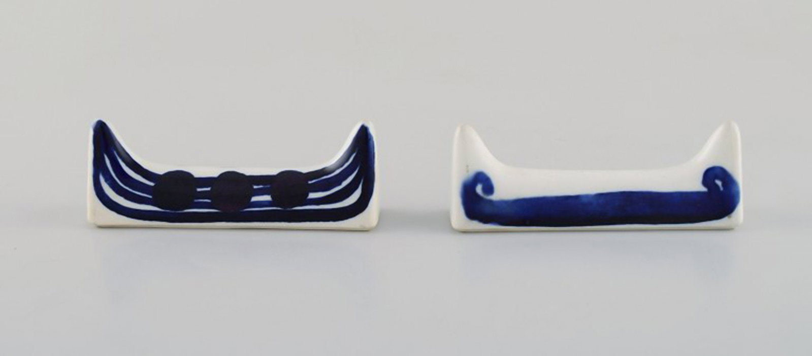 Gunvor Olin Gronqvist for Arabia. Two rare knife rests in glazed ceramics. 1960 / 70's.: Brand: Arabia Gunvor Olin Gronqvist for Arabia. Two rare knife rests in glazed ceramics. 1960 / 70's. Measures: 8 x 3 cm. In very good condition. Signed. Reserve: $119.00 Shipping: Domestic: Shipping 