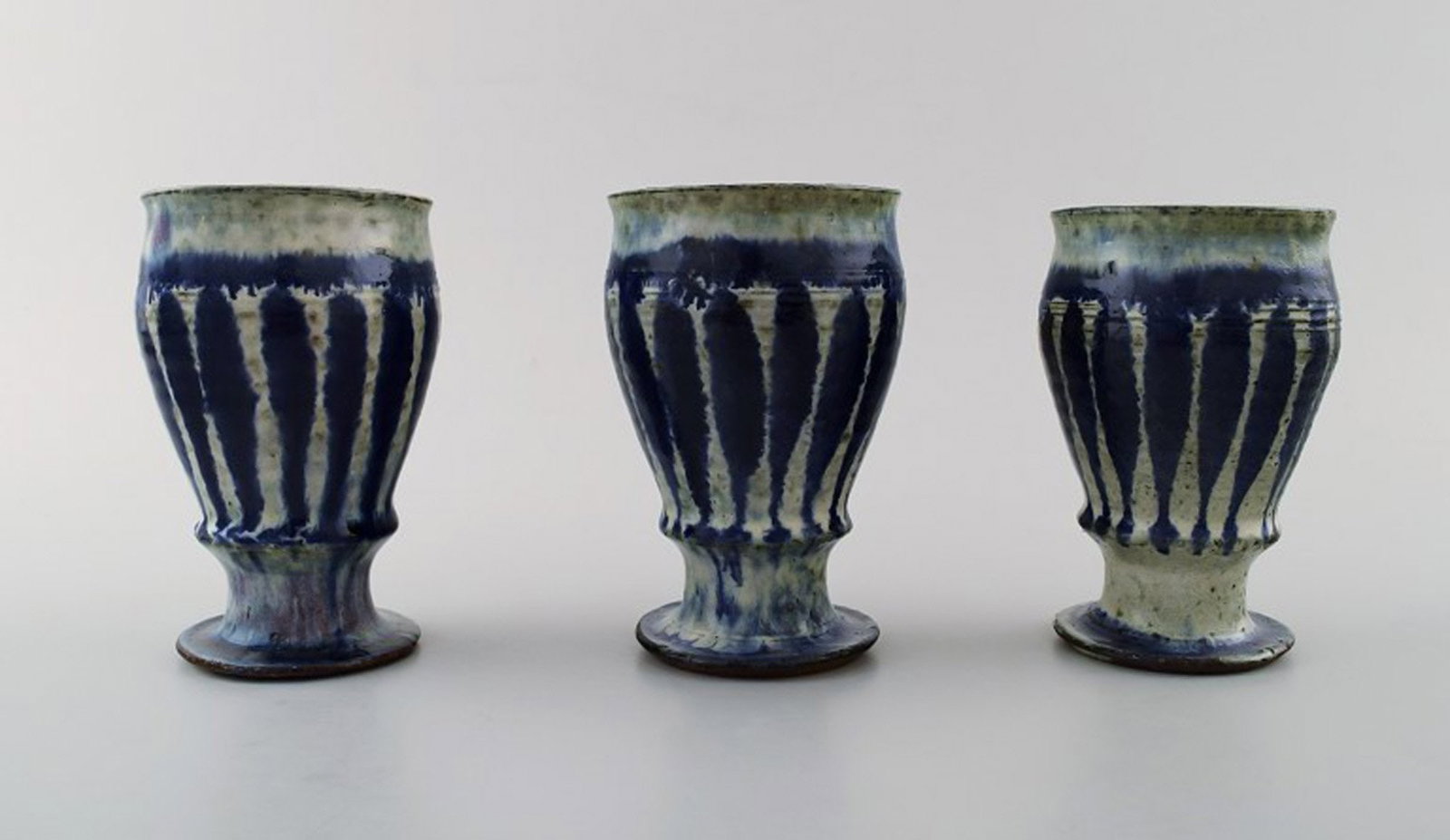 Gutte Eriksen, own workshop, three ceramic cups.: Brand: Various Gutte Eriksen, own workshop, three ceramic cups. Stamped. Measures 11 x 7 cm. In perfect condition. Reserve: $350.00 Shipping: Domestic: Shipping rates are determined by destination