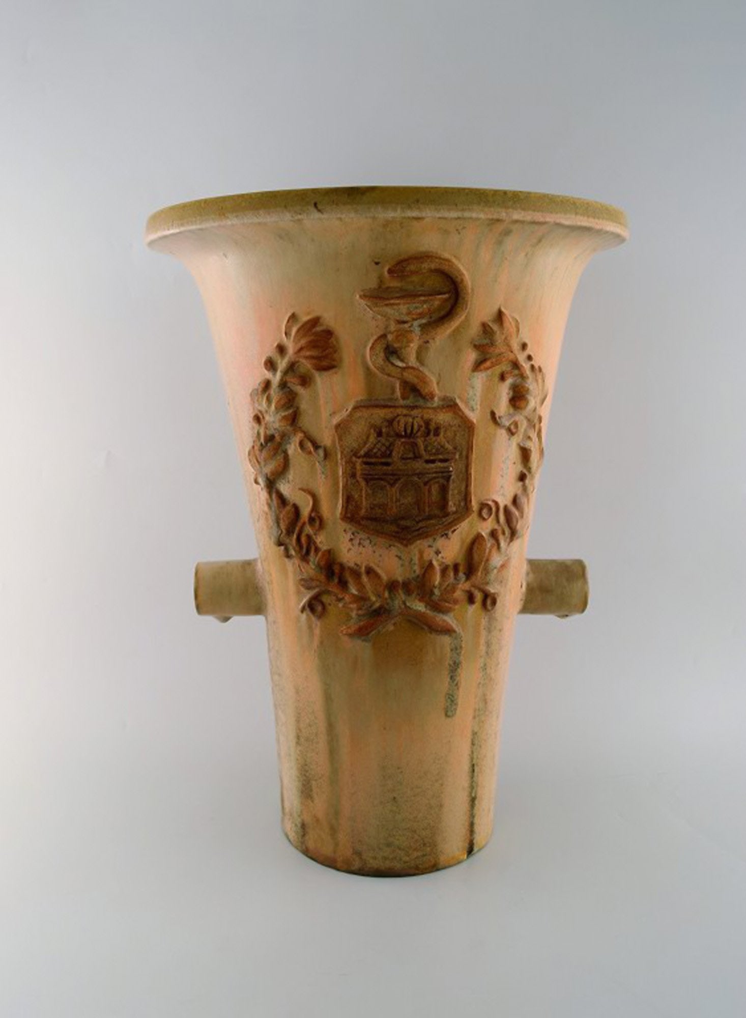 Colossal Arne Bang unique vase in glazed ceramics with brand from pharmacy in Aalborg, Denmark.: Brand: Various Colossal Arne Bang unique vase in glazed ceramics with brand from pharmacy in Aalborg, Denmark. Dated 1933. Decorated with Rod of Asclepius as a symbol of medicine. Measures: 49 x 36.5