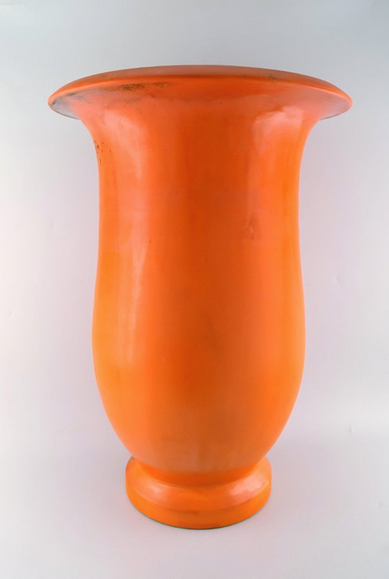 Svend Hammershøi for Kähler, HAK. Colossal floor vase in glazed stoneware.: Brand: Kähler Svend Hammershøi for Kähler, HAK. Colossal floor vase in glazed stoneware. Beautiful orange uranium glaze. In good condition. Minor burning mark at the buttom from product