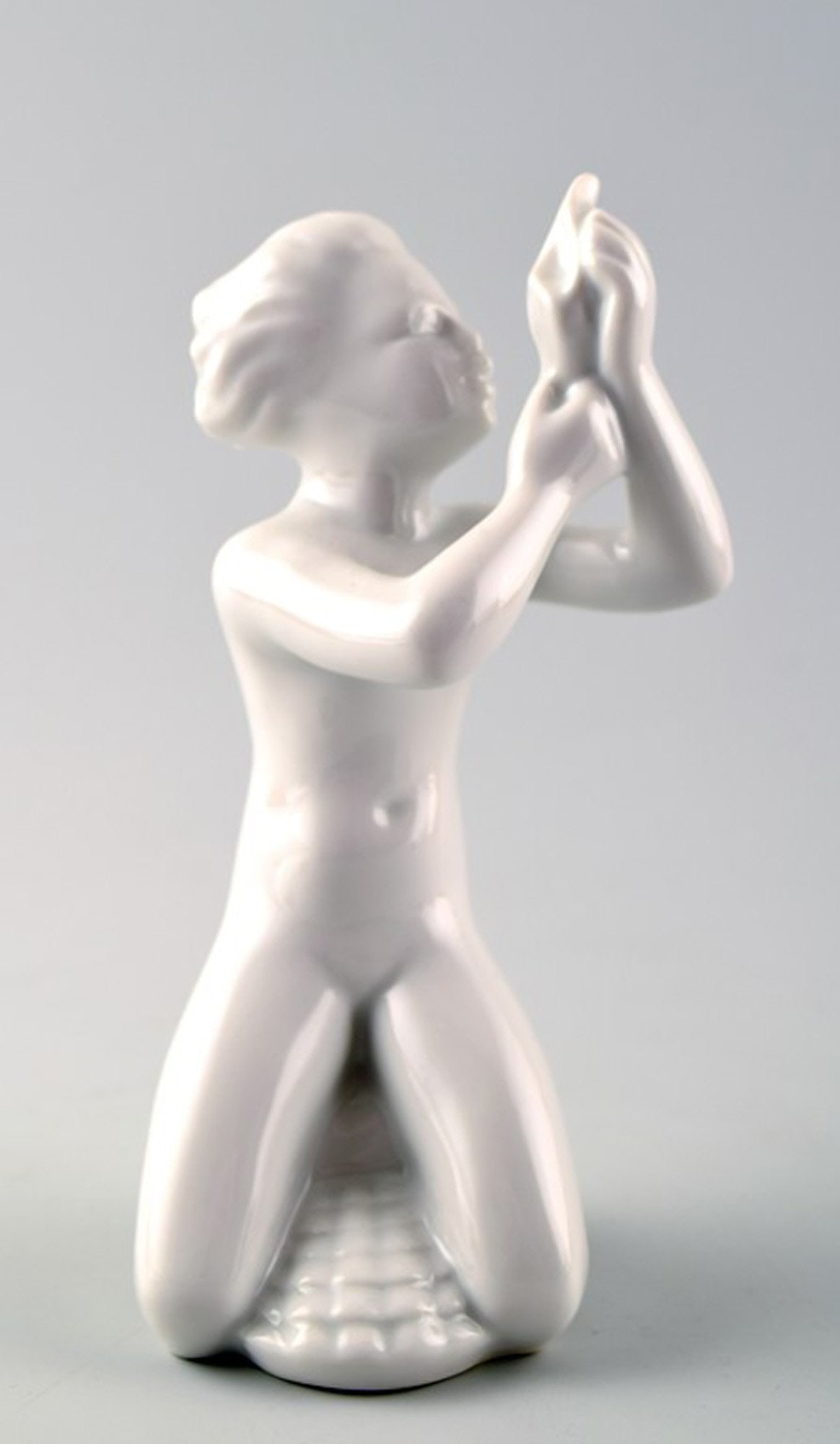 Harald Salomon for Rörstrand, white glazed figure of a sea child.: Brand: Rörstrand Harald Salomon for Rörstrand, white glazed figure of a sea child. Reserve: $49.00 Shipping: Domestic: Shipping rates are determined by destination International: Foreign