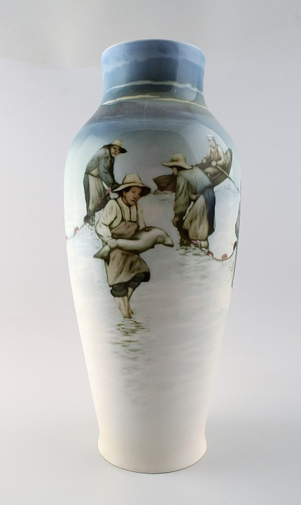 Large art deco Unique Rörstrand Nils Emil Lundström (1865-1960) porcelain vase. Decorated: Brand: Rörstrand Large art deco Unique Rörstrand Nils Emil Lundström (1865-1960) porcelain vase. Decorated with fishermen. Reserve: $525.00 Shipping: Domestic: Shipping rates are