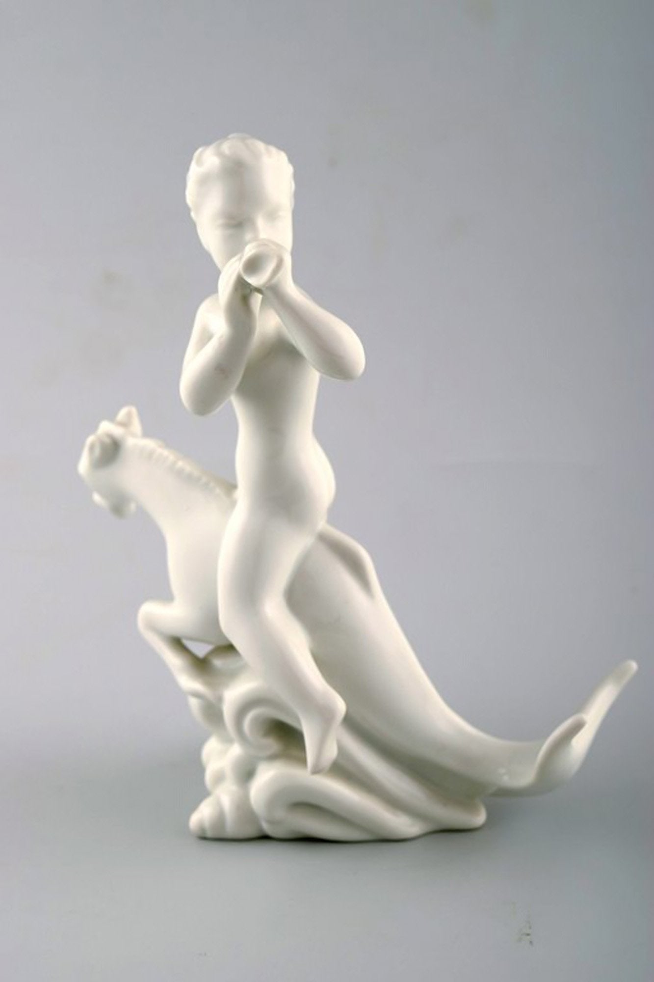 Harald Salomon for Rörstrand, blanc de chine / white glazed figure of a fawn riding on fabel: Brand: Rörstrand Harald Salomon for Rörstrand, blanc de chine / white glazed figure of a fawn riding on fabel creature. Reserve: $95.00 Shipping: Domestic: Shipping rates are determined by