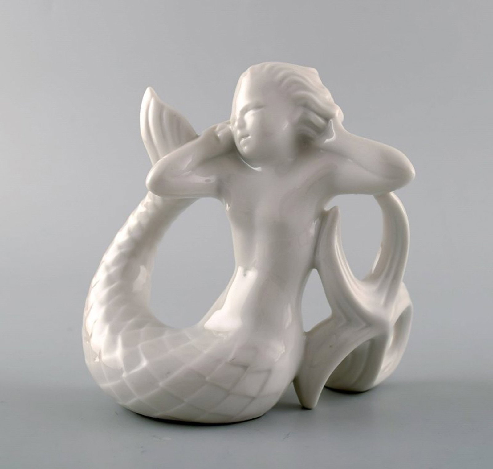Harald Salomon for Rörstrand, white glazed figure of a faun / pan.: Brand: Rörstrand Harald Salomon for Rörstrand, white glazed figure of a faun / pan. Reserve: $60.00 Shipping: Domestic: Shipping rates are determined by destination International: Foreign