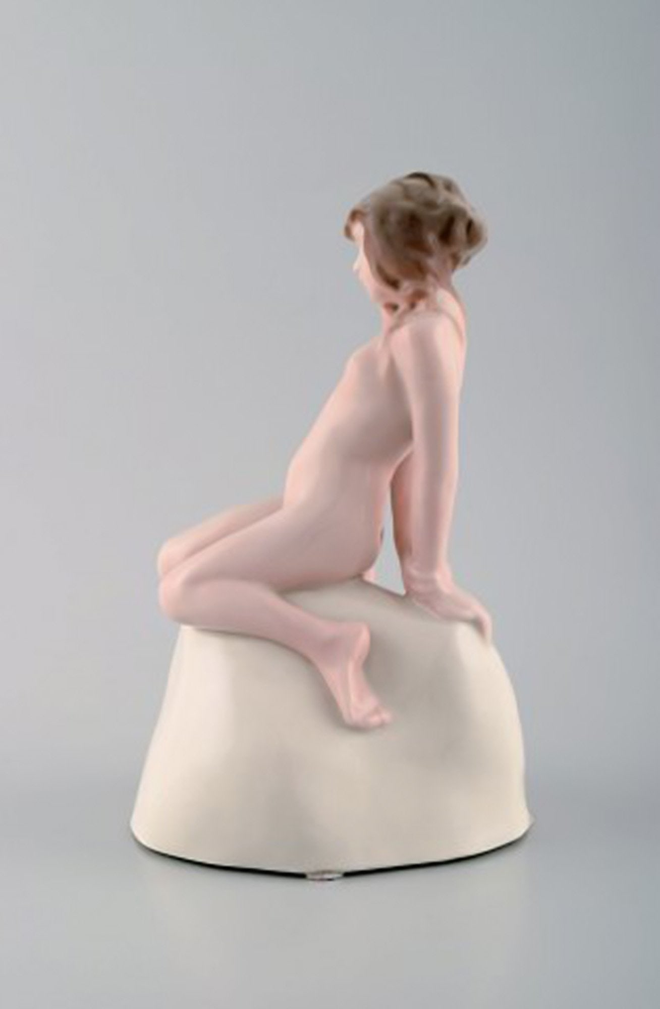Vicken von Post for Rörstrand, Rare art deco figure in porcelain. Young nude woman on stone. - 2