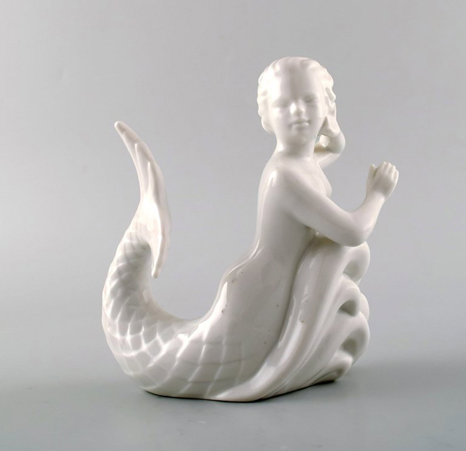 Harald Salomon for Rörstrand, white glazed figure of a faun/pan.: Brand: Rörstrand Harald Salomon for Rörstrand, white glazed figure of a faun/pan. Reserve: $60.00 Shipping: Domestic: Shipping rates are determined by destination International: Foreign