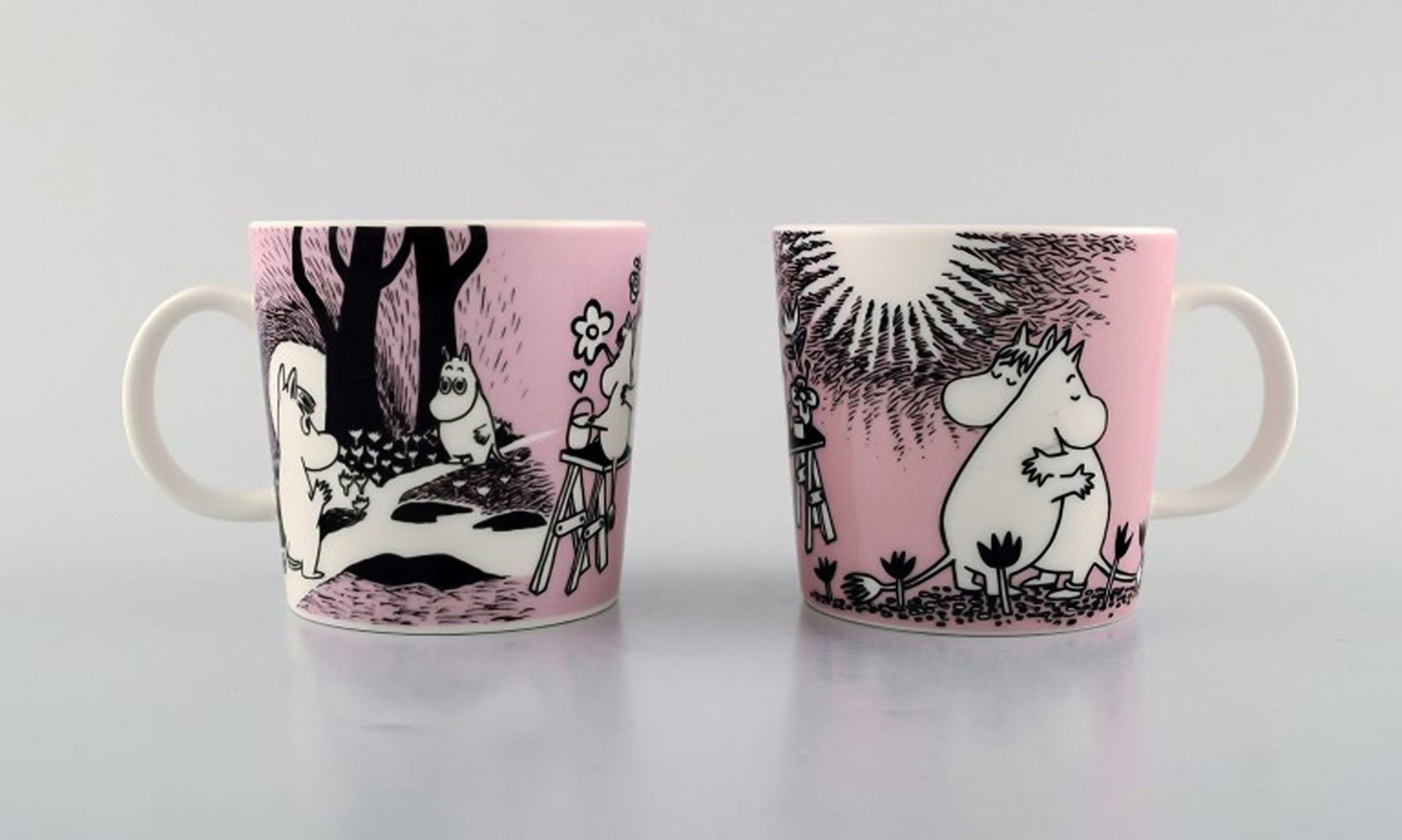 Arabia, Finland. Two cups in porcelain with motifs from "Moomin". Late 20th century.: Brand: Arabia Arabia, Finland. Two cups in porcelain with motifs from "Moomin". Late 20th century. Reserve: $189.00 Shipping: Domestic: Shipping rates are determined by destination International: