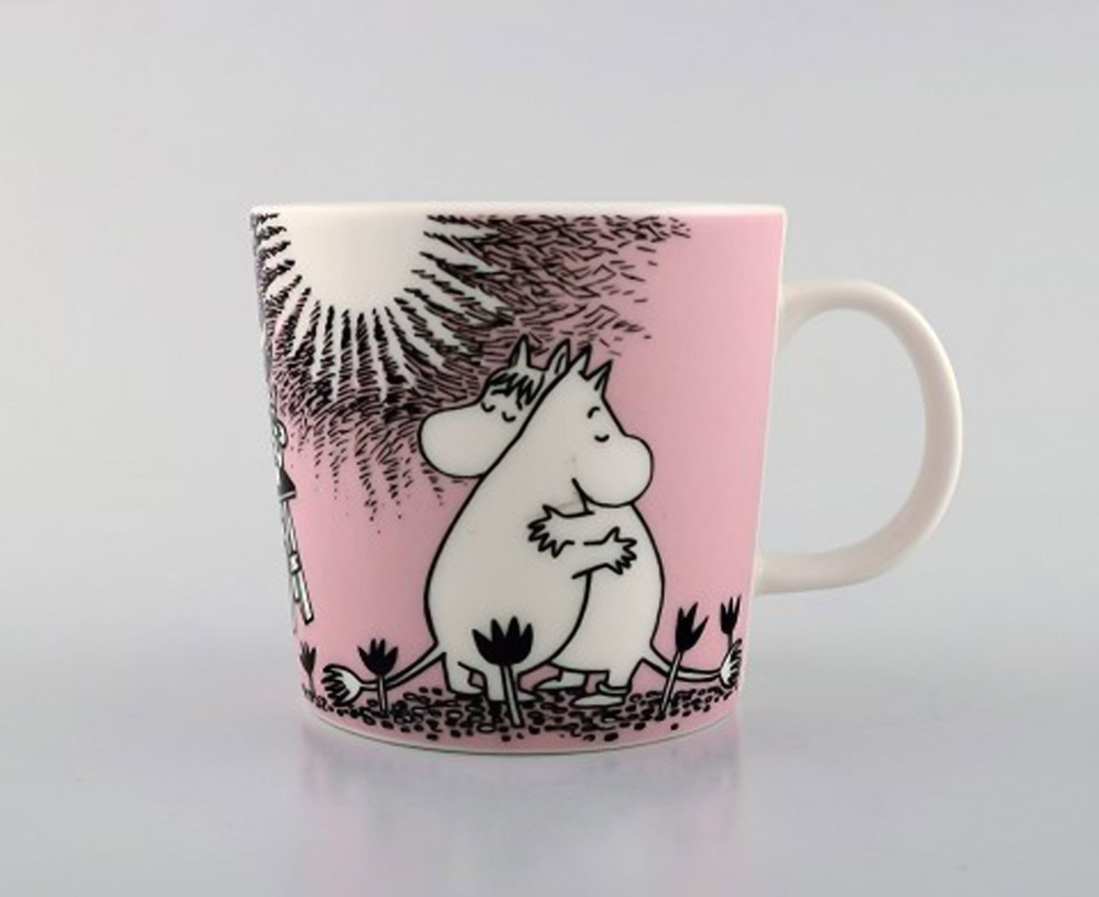 Arabia, Finland. Two cups in porcelain with motifs from "Moomin". Late 20th century. - 2