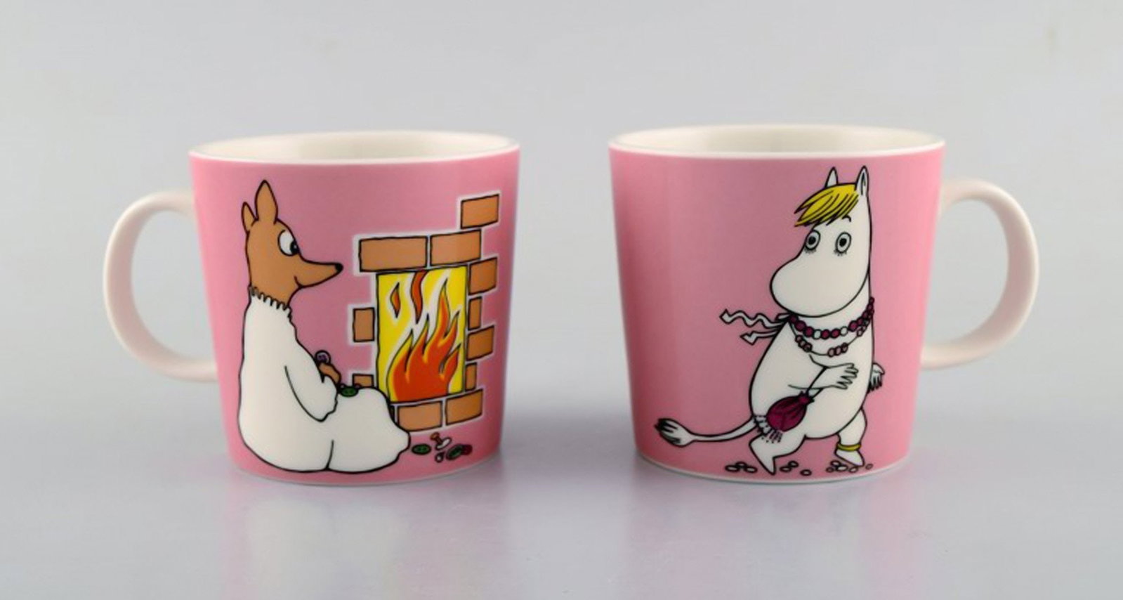 Arabia, Finland. Two cups in porcelain with motifs from "Moomin". Late 20th century.: Brand: Arabia Arabia, Finland. Two cups in porcelain with motifs from "Moomin". Late 20th century. Reserve: $189.00 Shipping: Domestic: Shipping rates are determined by destination International: