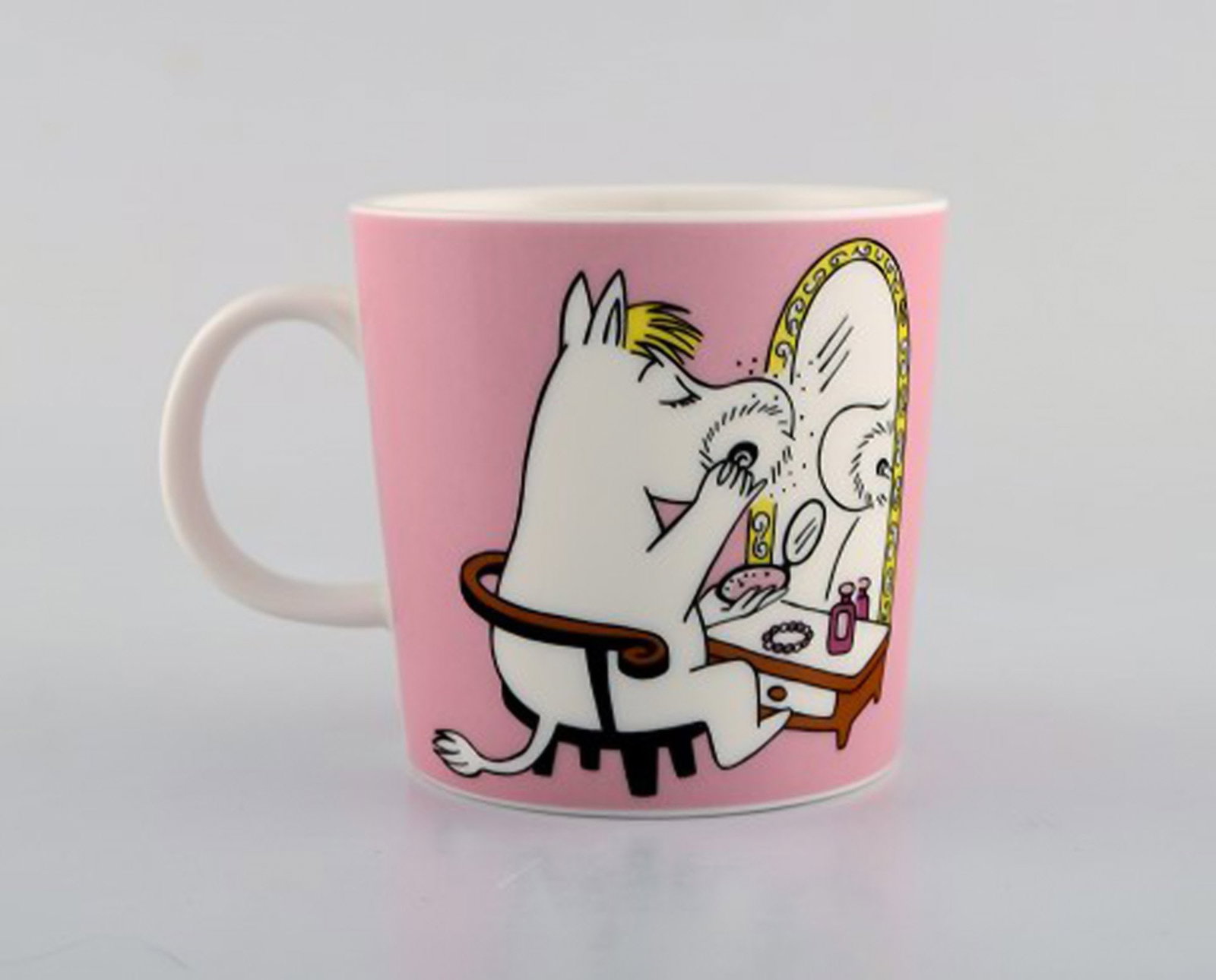 Arabia, Finland. Two cups in porcelain with motifs from "Moomin". Late 20th century. - 2