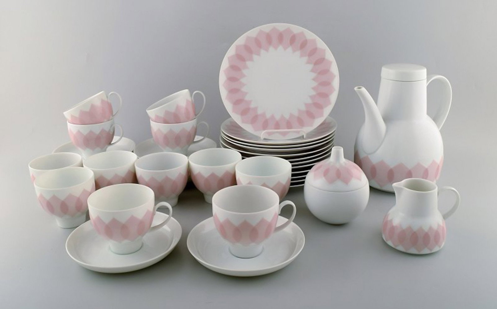 Bjørn Wiinblad for Rosenthal. Pink "Lotus" porcelain coffee service for twelve persons. 1980's.: Brand: Rosenthal Bjørn Wiinblad for Rosenthal. Pink "Lotus" porcelain coffee service for twelve persons. 1980's. Reserve: $700.00 Shipping: Domestic: Shipping rates are determined by destination 