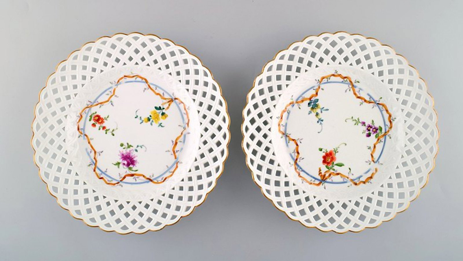 Two antique Meissen plates in pierced porcelain with hand-painted floral motifs. Museum Quality.: Brand: Meissen Two antique Meissen plates in pierced porcelain with hand-painted floral motifs. Museum Quality. Dated 1773-1814. Reserve: $938.00 Shipping: Domestic: Shipping rates are determined by