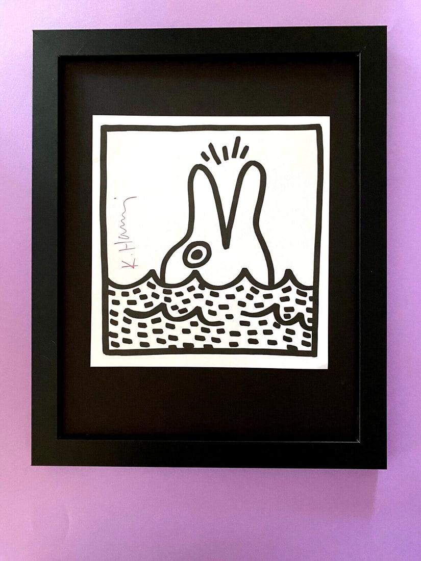 Keith Haring | Vibrant & Iconic Print Signed Mounted & Framed 14x11: Facsimile Signed in ink. Art Print is about 8 X 8 in. This piece is mounted on a 11 x 14 in. black acid free black board. New Framing covering an area of 15x12in. This is a Vintage 1989 Print. Reserve