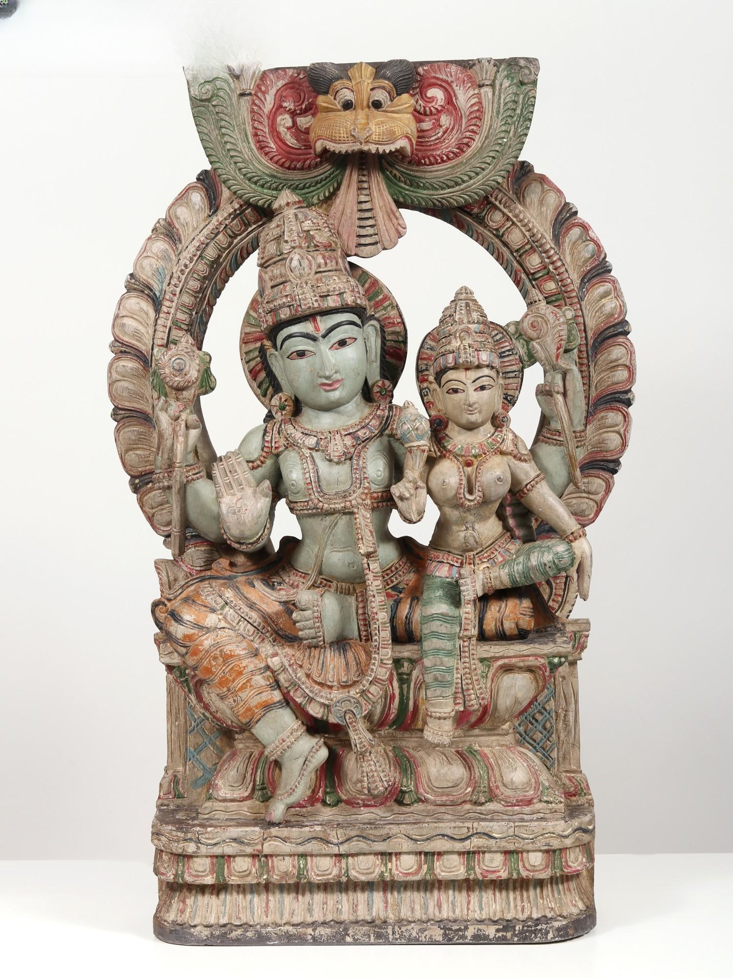 36" Lord Vishnu With Goddess Lakshmi | Wood Statue and Wall Hanging: Title: 36" Lord Vishnu With Goddess Lakshmi | Wood Statue and Wall Hanging Description: Additional Information: Hindu Gods & Goddesses Statues Reserve: $1,030.00 Shipping: Domestic: Flat-rate of $114.