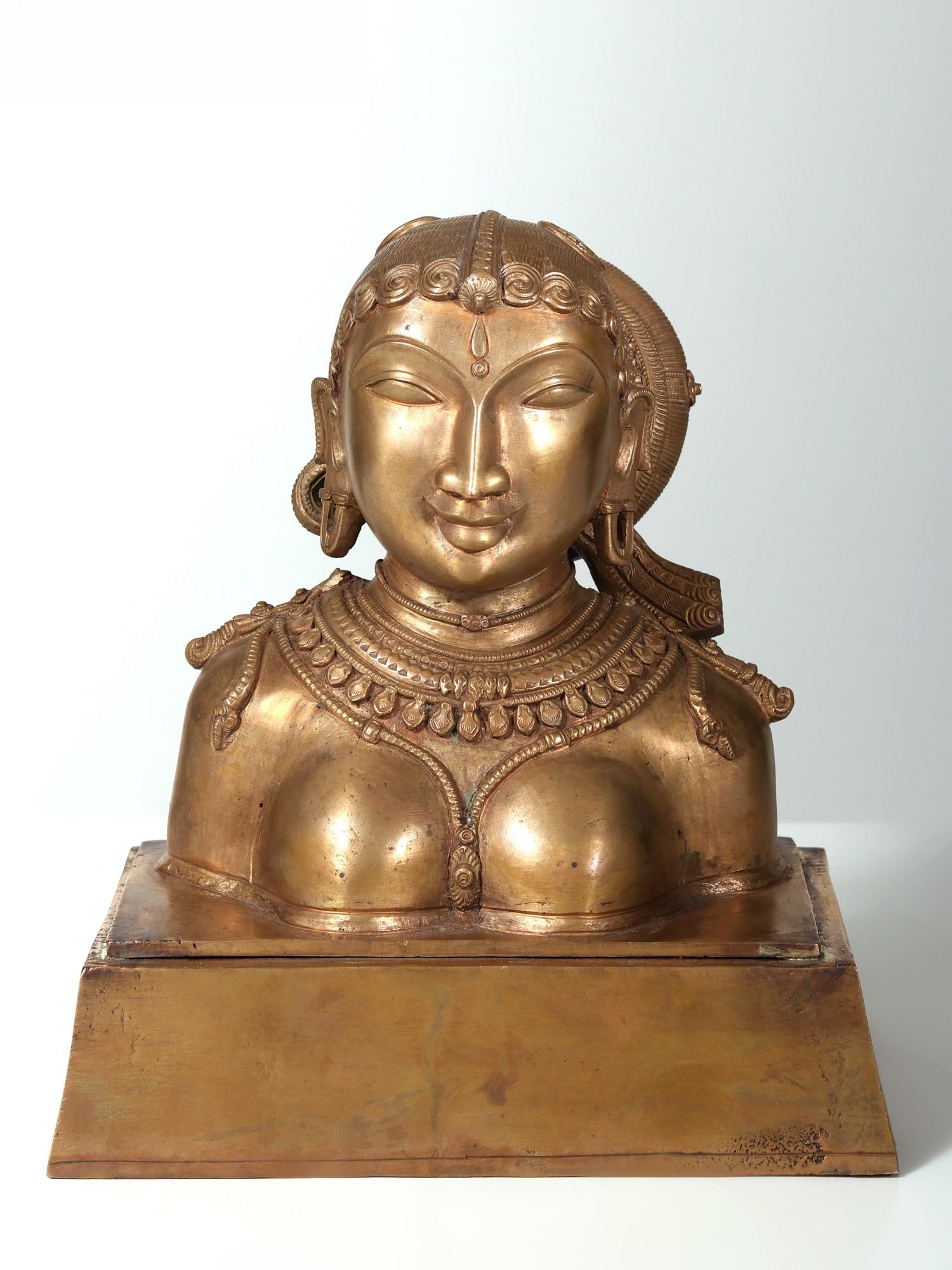 9" Goddess Parvati Bust | Brass Statue: Title: 9" Goddess Parvati Bust | Brass Statue Description: Shailasuta- the daughter of Shaila or Mountain king Himalaya, goddess Parvati is the supreme divine feminine, in whom reside all the womanly 