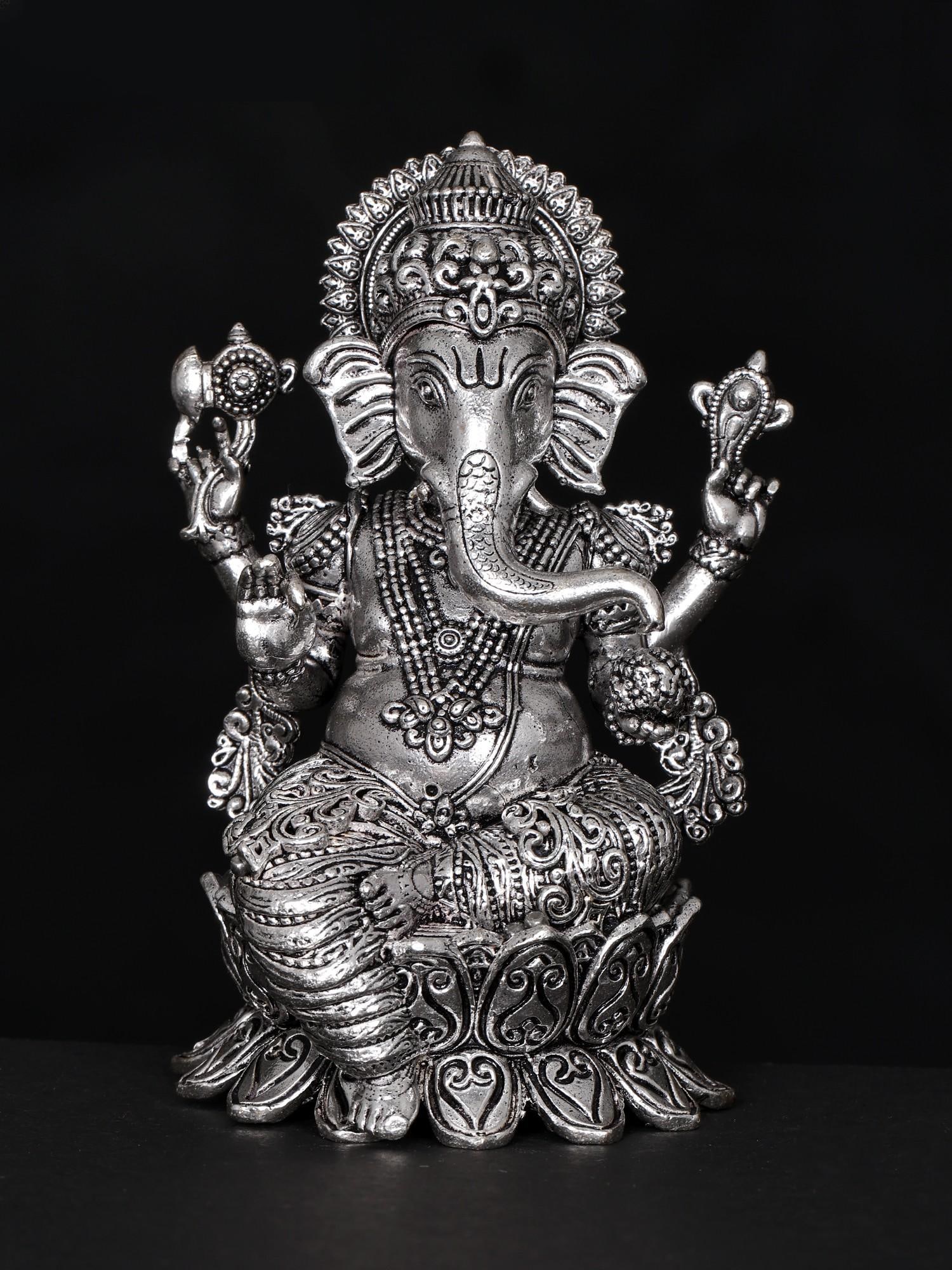 3" Attractive Superfine Lord Ganesha Statue: Title: 3" Attractive Superfine Lord Ganesha Statue Description: Seated gracefully upon a lotus, Lord Ganesha, the bestower of eternal bliss, emerges as the epitome of divine splendour. Cloaked in rega