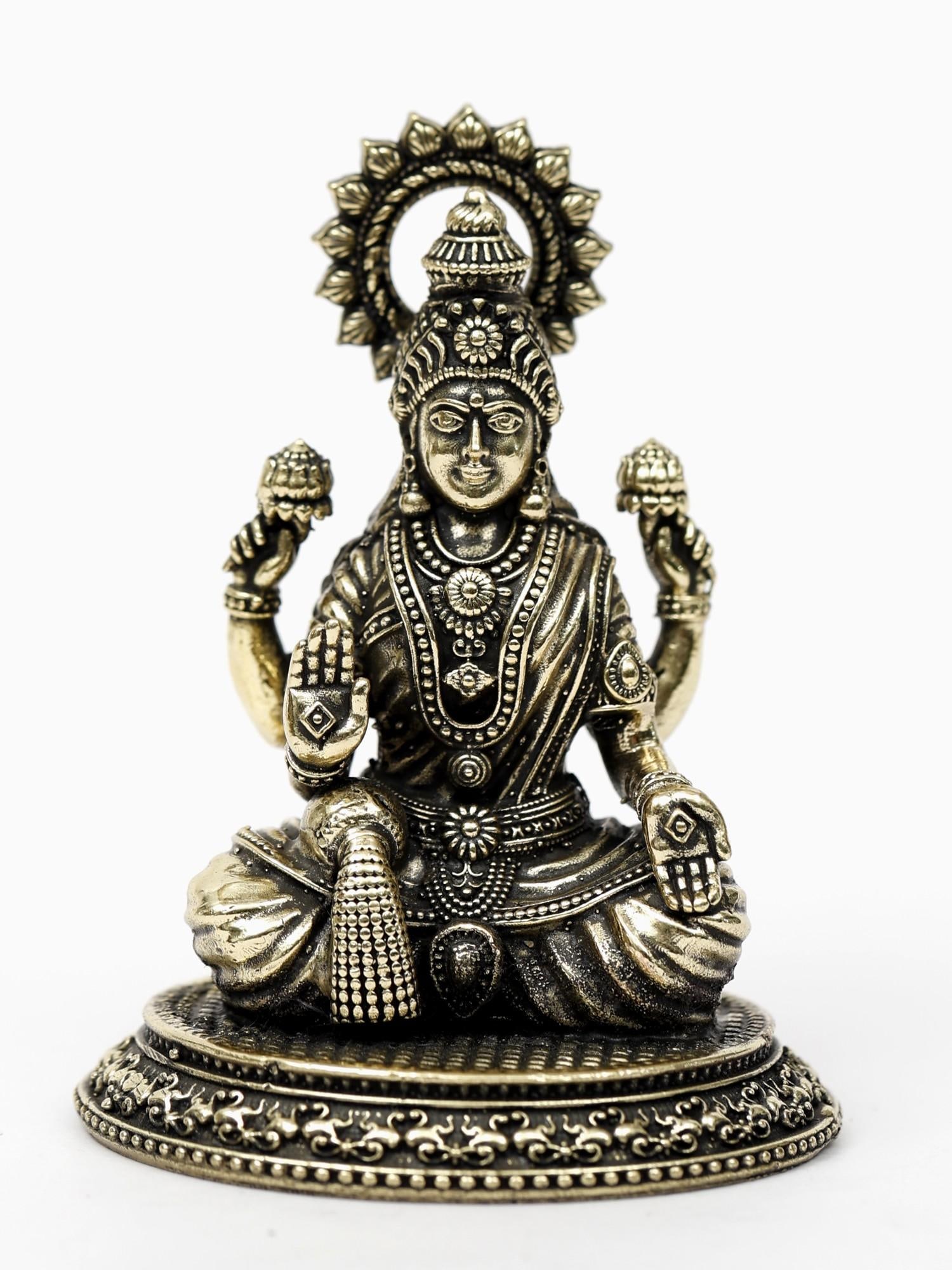 Blessing Dhanalakshmi Figurine in Brass | Small Brass Statues: Title: Blessing Dhanalakshmi Figurine in Brass | Small Brass Statues Description: Goddess Dhanalakshmi is a form of Goddess Lakshmi and is believed to bless with abundance and also eradicate poverty. 