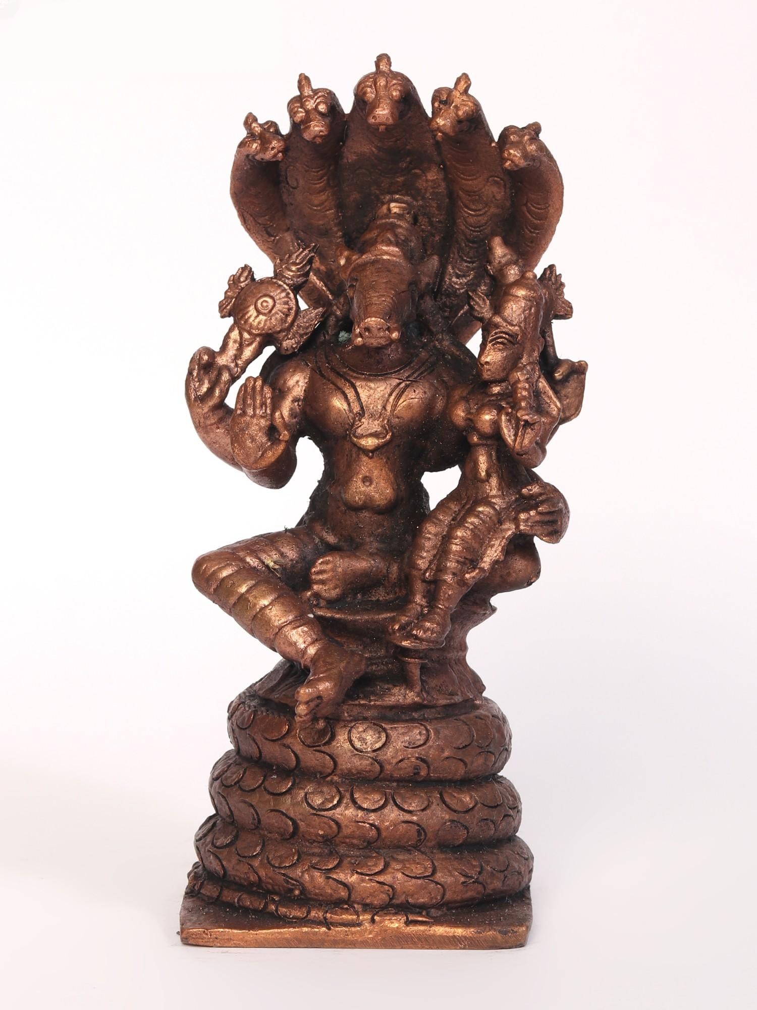5" Small Lord Hayagreeva Idol with Devi Lakshmi Seated on Sheshnag: Title: 5" Small Lord Hayagreeva Idol with Devi Lakshmi Seated on Sheshnag Description: In this copper rendition, Lord Hayagriva, the horse-headed avatar of Lord Vishnu, emerges as the embodiment of wi