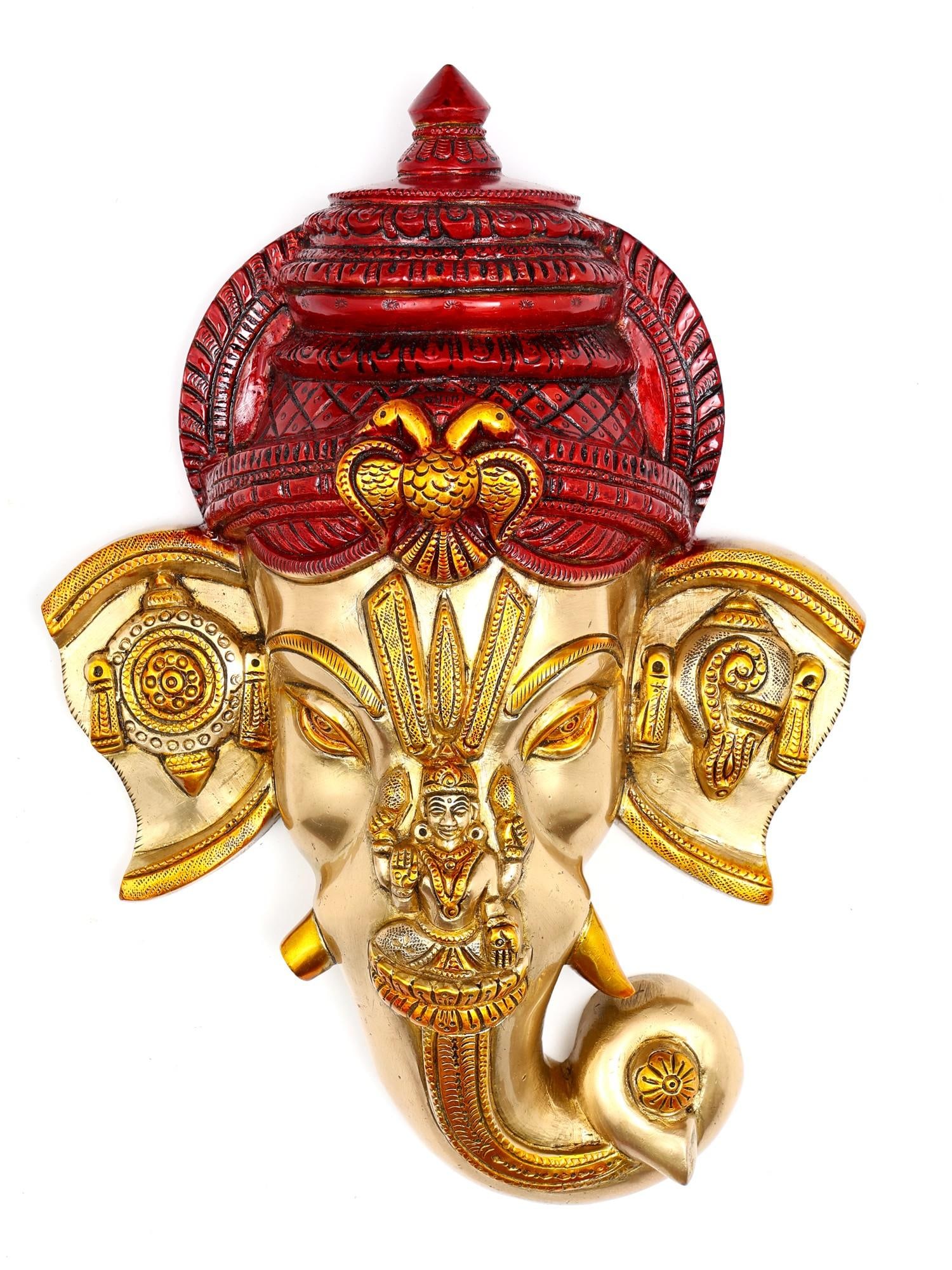 12" Brass Lord Ganesha Wall Hanging Mask with Goddess Lakshmi: Title: 12" Brass Lord Ganesha Wall Hanging Mask with Goddess Lakshmi Description: There have been rare instances when a sacred object has been further sanctified by adding more divine images. This Bra