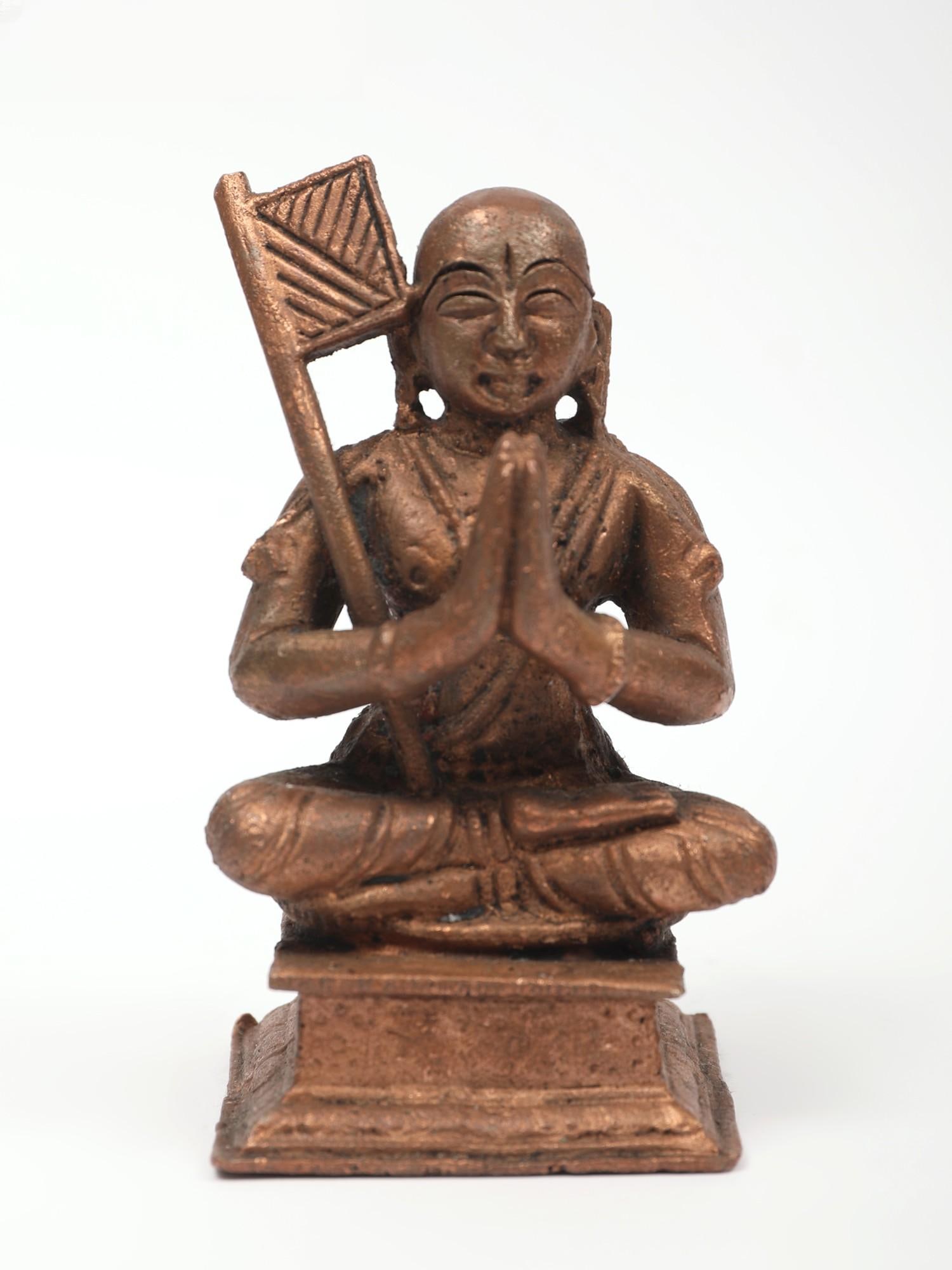 3" Small Swami Ramanujacharya Copper Statue: Title: 3" Small Swami Ramanujacharya Copper Statue Description: Considered one of the most benevolent souls on earth Ramanuja, sometimes called Ramanujacharya or Ilaiya Perumal, was a South Indian Bra
