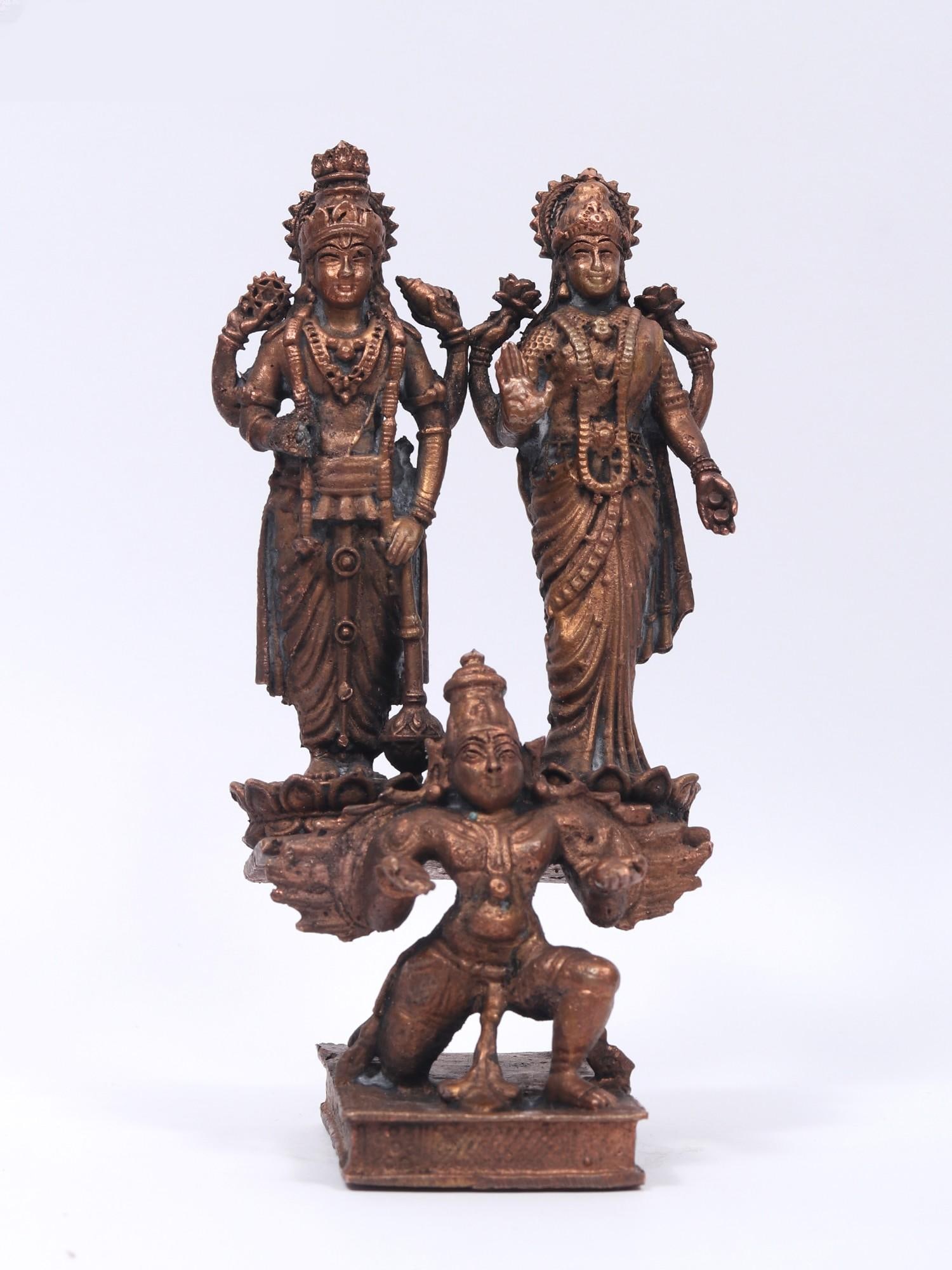 5" Small Lakshmi - Narayana Standing on Garuda | Copper Statue: Title: 5" Small Lakshmi - Narayana Standing on Garuda | Copper Statue Description: Additional Information: Hindu Gods & Goddesses Statues Reserve: $130.00 Shipping: Domestic: Flat-rate of $14.00 to an