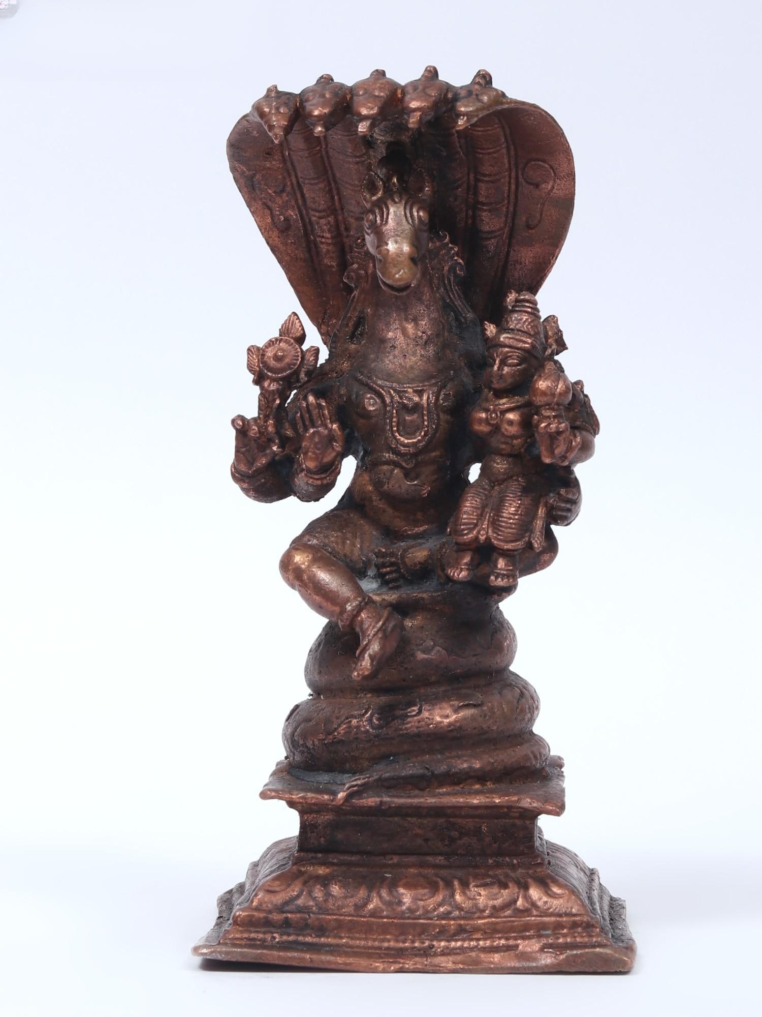4" Small Lord Hayagreeva Seated Under The Sheshnag with Devi Lakshmi | Copper Statue: Title: 4" Small Lord Hayagreeva Seated Under The Sheshnag with Devi Lakshmi | Copper Statue Description: Additional Information: Small Sized Statues Reserve: $103.00 Shipping: Domestic: Flat-rate of $