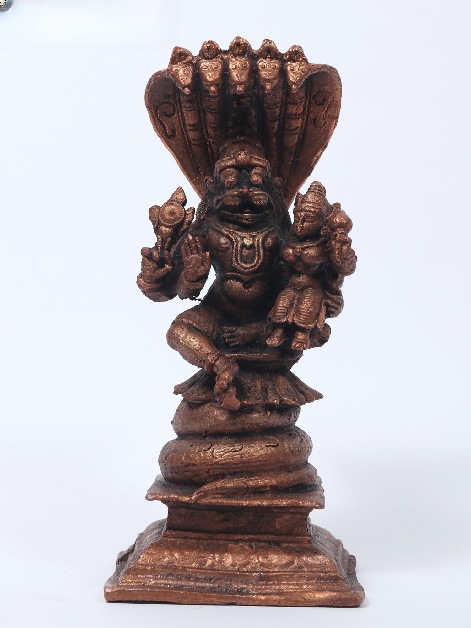 4" Small Lakshmi - Narasimha Seated Under The Sheshnag | Copper Statue: Title: 4" Small Lakshmi - Narasimha Seated Under The Sheshnag | Copper Statue Description: Additional Information: Small Sized Statues Reserve: $103.00 Shipping: Domestic: Flat-rate of $11.00 to