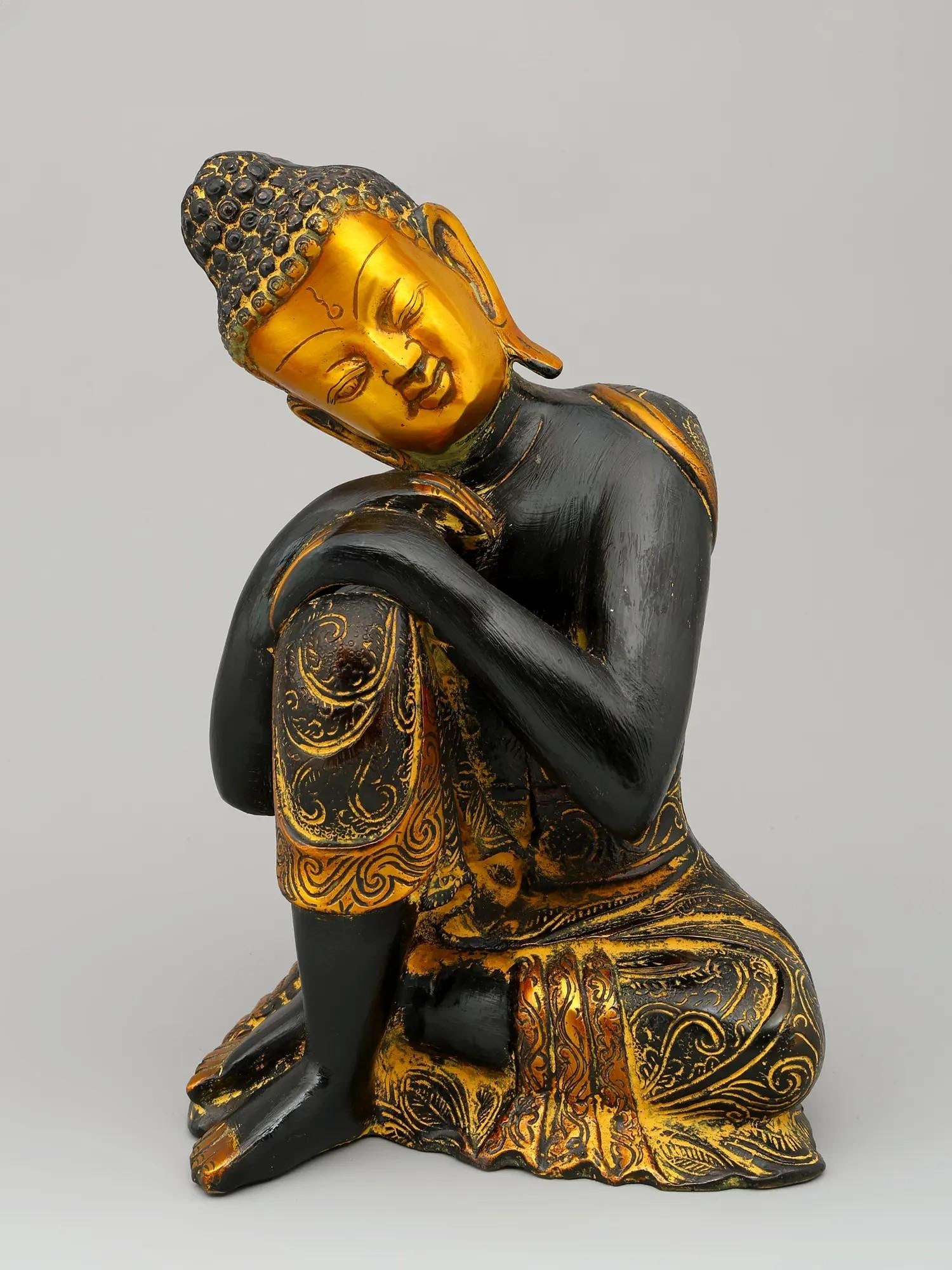 11" Thinking Buddha Brass Statue: Title: 11" Thinking Buddha Brass Statue Description: Self-reflection is an essential component of living a peaceful life. This Thinking Buddha Brass statue represents Buddha as an incarnation who is