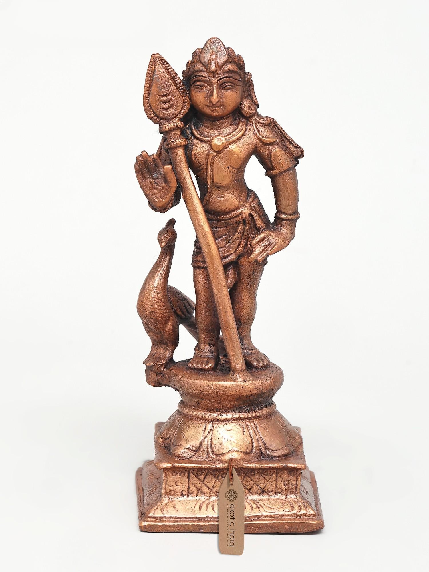 5" Small Lord Murugan (Karttikeya) | Copper Statue: Title: 5" Small Lord Murugan (Karttikeya) | Copper Statue Description: Lord Kartikeya, the son of Shiva and Parvati, was the great leader of the gods' army, destined to defeat the monster Tarakasura.
