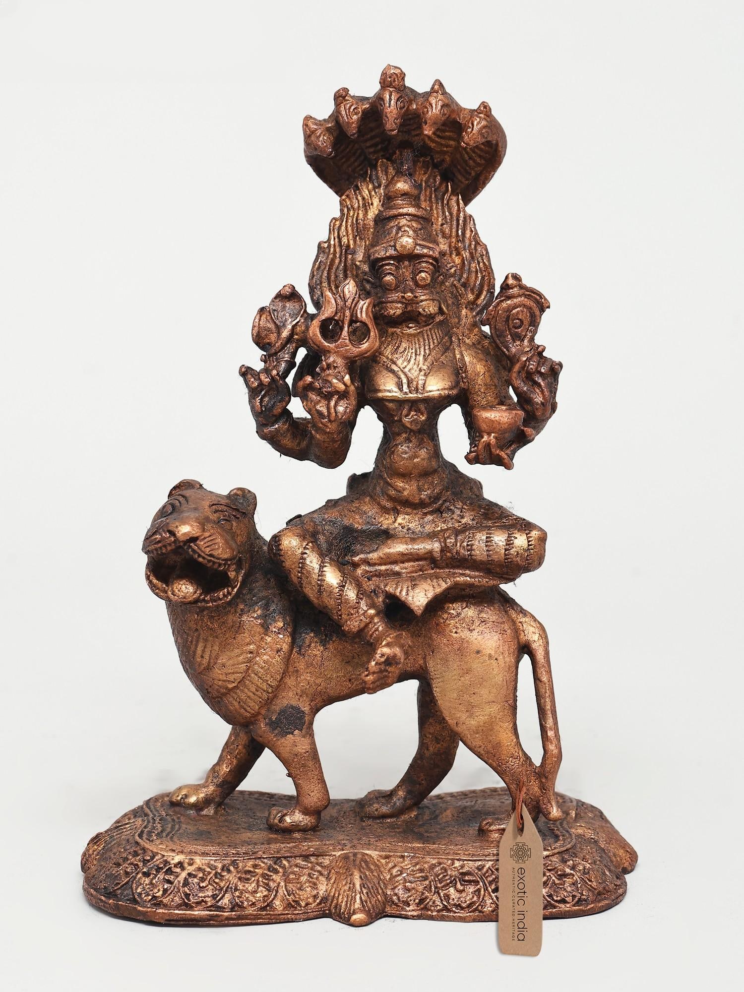 5" Small Goddess Pratyangira (Atharvana Bhadrakali) | Copper Statue: Title: 5" Small Goddess Pratyangira (Atharvana Bhadrakali) | Copper Statue Description: This Copper Statue is a divine visage of Mother Pratyangira, who has a ferocious face and never stops protecting