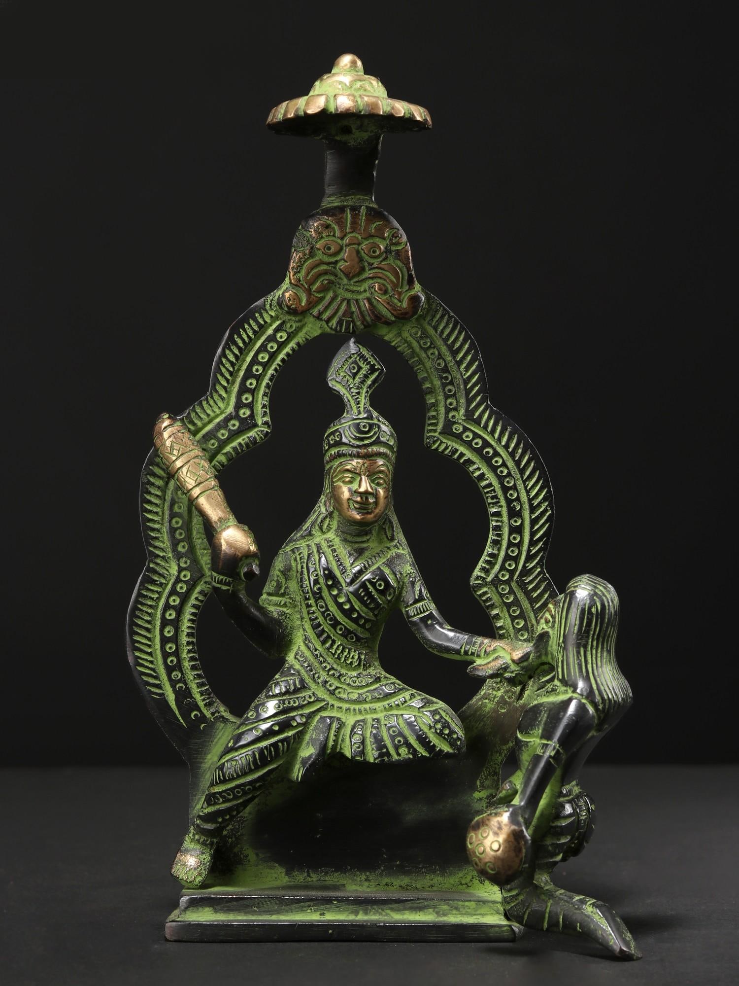 7" Mahavidya Bagalamukhi Brass Statue: Title: 7" Mahavidya Bagalamukhi Brass Statue Description: Maa Bagalamukhi is a revered deity in Hinduism, embodying the power to conquer adversities and suppress negative forces. Depicted with a