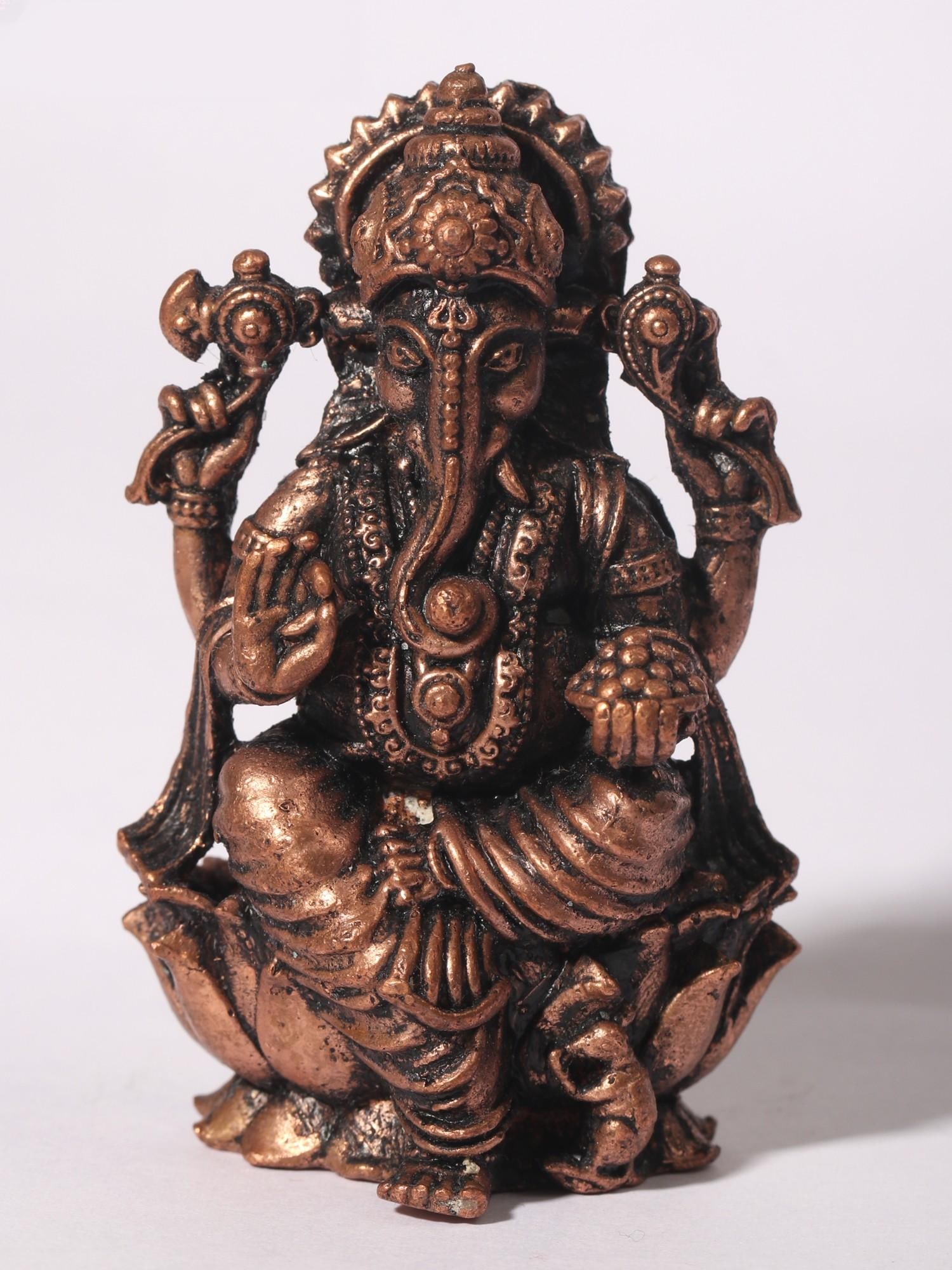 2" Small Blessing Lord Ganapati Seated on Lotus | Copper Statue: Title: 2" Small Blessing Lord Ganapati Seated on Lotus | Copper Statue Description: In Hindu tradition, offering daily worship to Lord Ganesha involves reciting prayers, chanting mantras like the