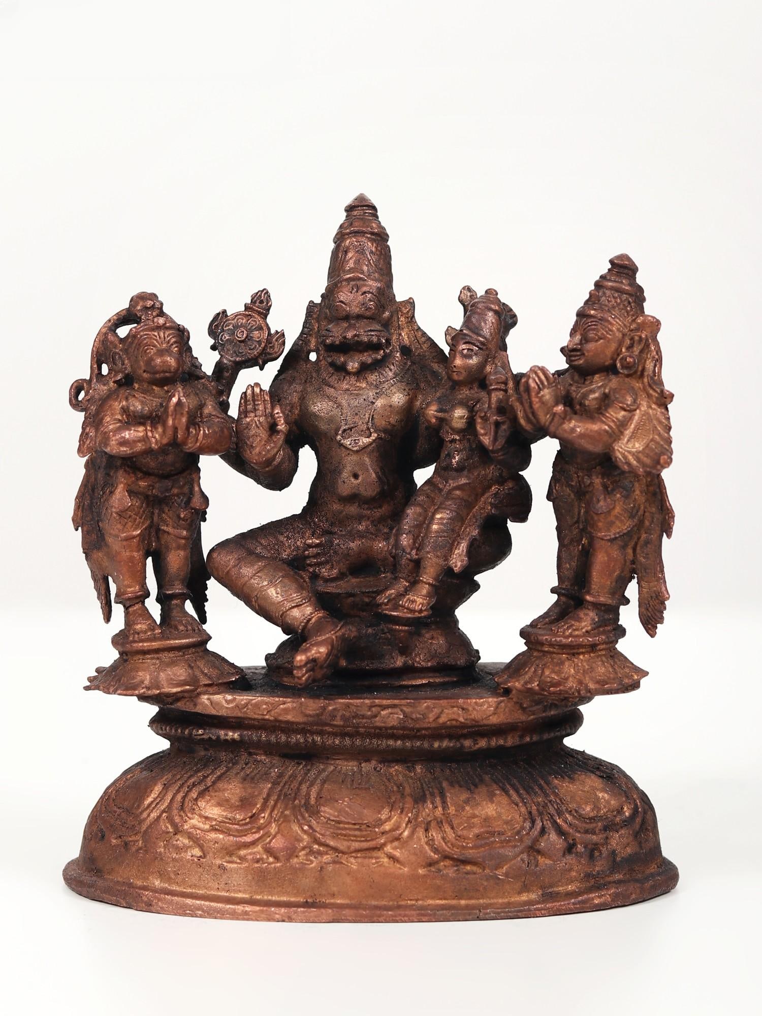 5" Small Lakshmi - Narasimha Idol with Garuda and Hanuman | Copper Statue: Title: 5" Small Lakshmi - Narasimha Idol with Garuda and Hanuman | Copper Statue Description: Worshipping the Small Lakshmi-Narasimha with Garuda and Hanuman Copper Statue holds immense importance as 