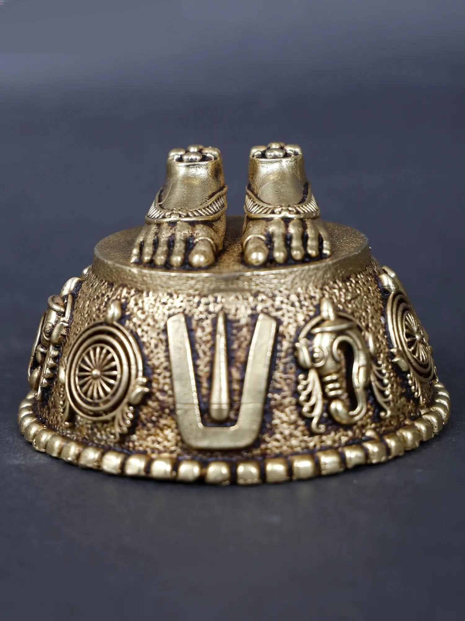 Small Brass Goddess Lakshmi Padam with Vaishnava Symbols: Title: Small Brass Goddess Lakshmi Padam with Vaishnava Symbols Description: Embrace the blessings of prosperity and auspiciousness with this exquisite Small Brass Goddess Lakshmi Padam adorned with