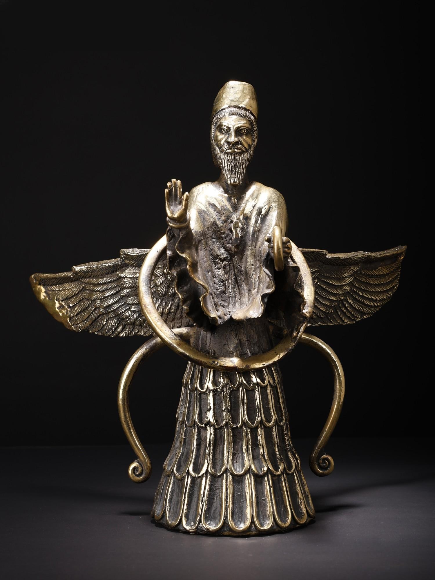 11" Asho Farohar Brass and Stone Sculpture: Title: 11" Asho Farohar Brass and Stone Sculpture Description: This statue of Asho Farohar crafted from stone and brass is a profound embodiment of Zoroastrian spirituality and cultural heritage. Asho