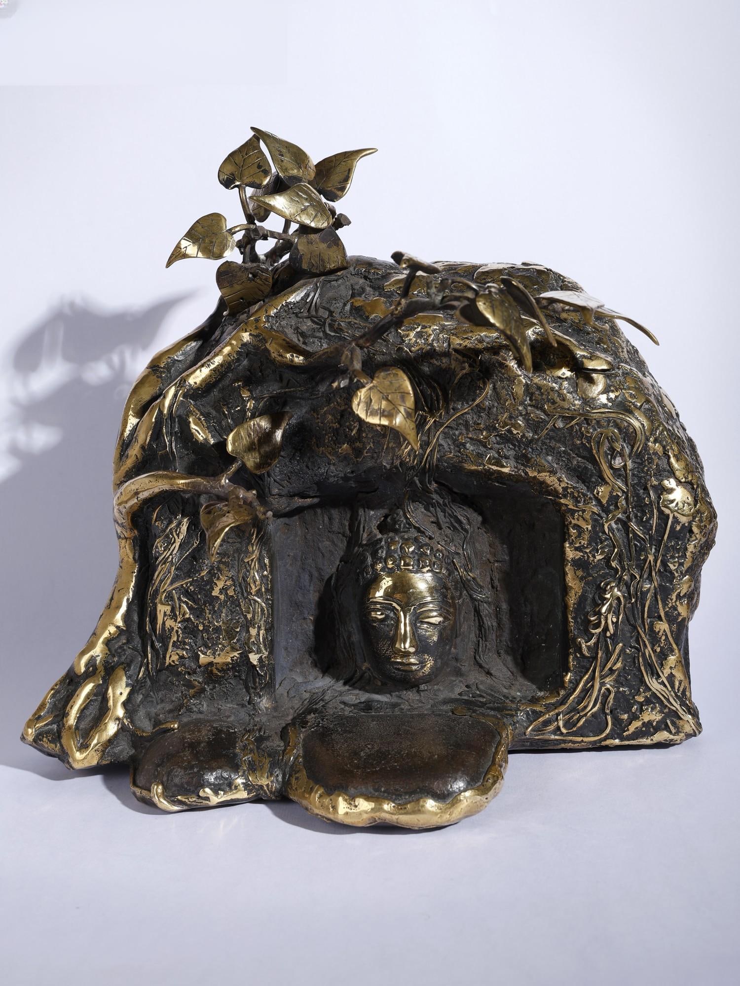 10" Buddha in Nature | Brass and Stone Sculpture: Title: 10" Buddha in Nature | Brass and Stone Sculpture Description: This Brass and Stone statue beautifully captures Buddha's serene presence amidst nature, drawing inspiration from the tranquil surr