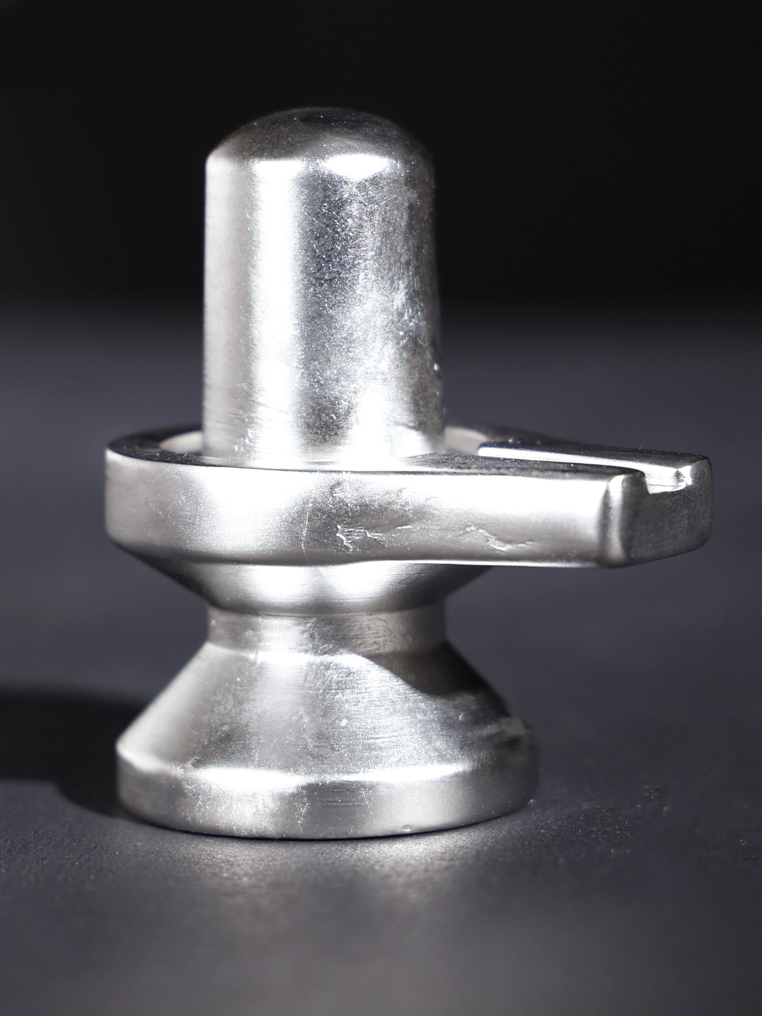 Small Parad (Mercury) Shivalinga: Title: Small Parad (Mercury) Shivalinga Description: Additional Information: Hindu Gods & Goddesses Statues Reserve: $316.00 Shipping: Domestic: Flat-rate of $35.00 to anywhere within the contiguous