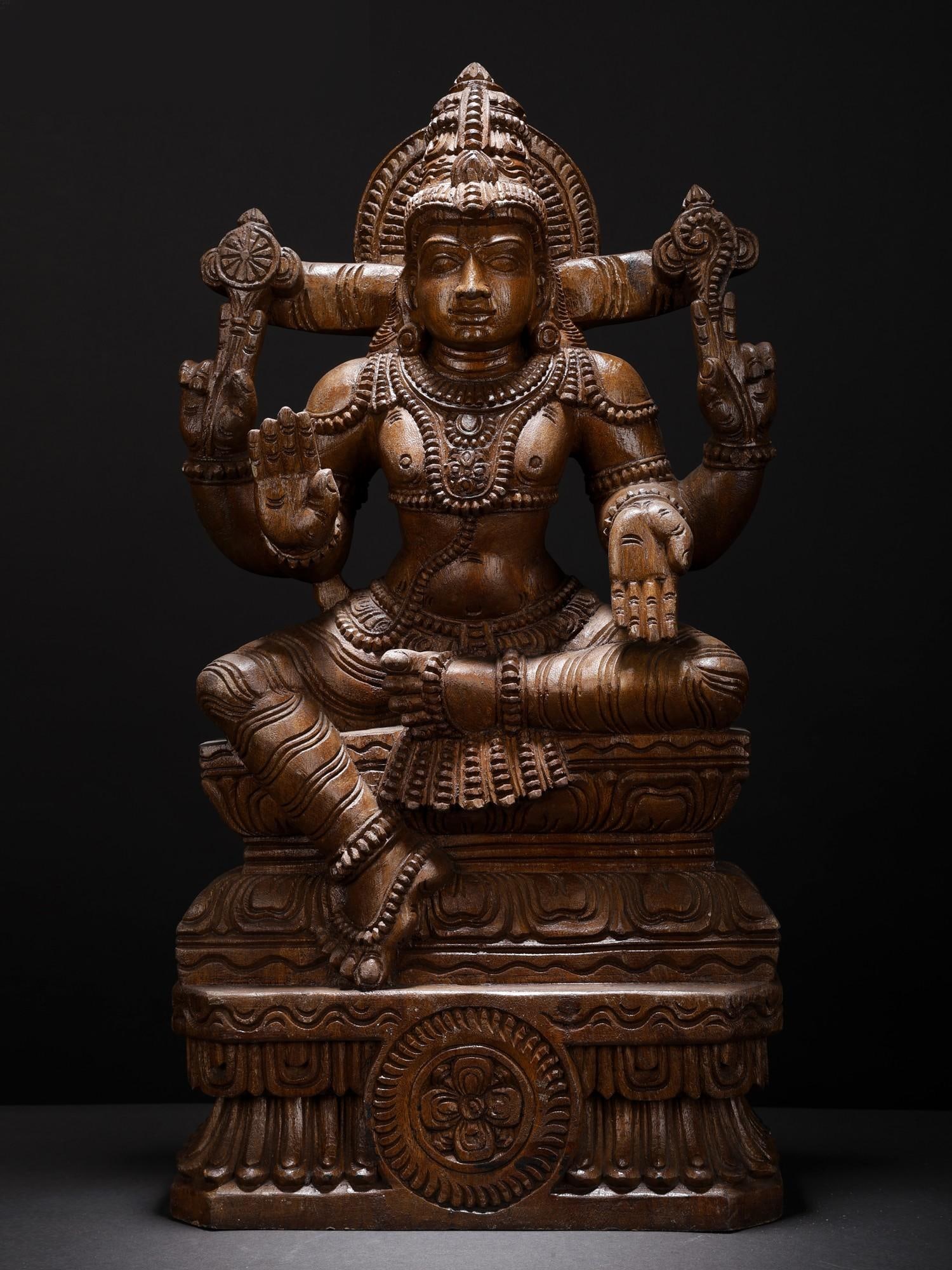 24" Blessing Lord Vishnu | Wood Carved Statue: Title: 24" Blessing Lord Vishnu | Wood Carved Statue Description: Additional Information: Hindu Gods & Goddesses Statues Reserve: $512.00 Shipping: Domestic: Flat-rate of $57.00 to anywhere within the