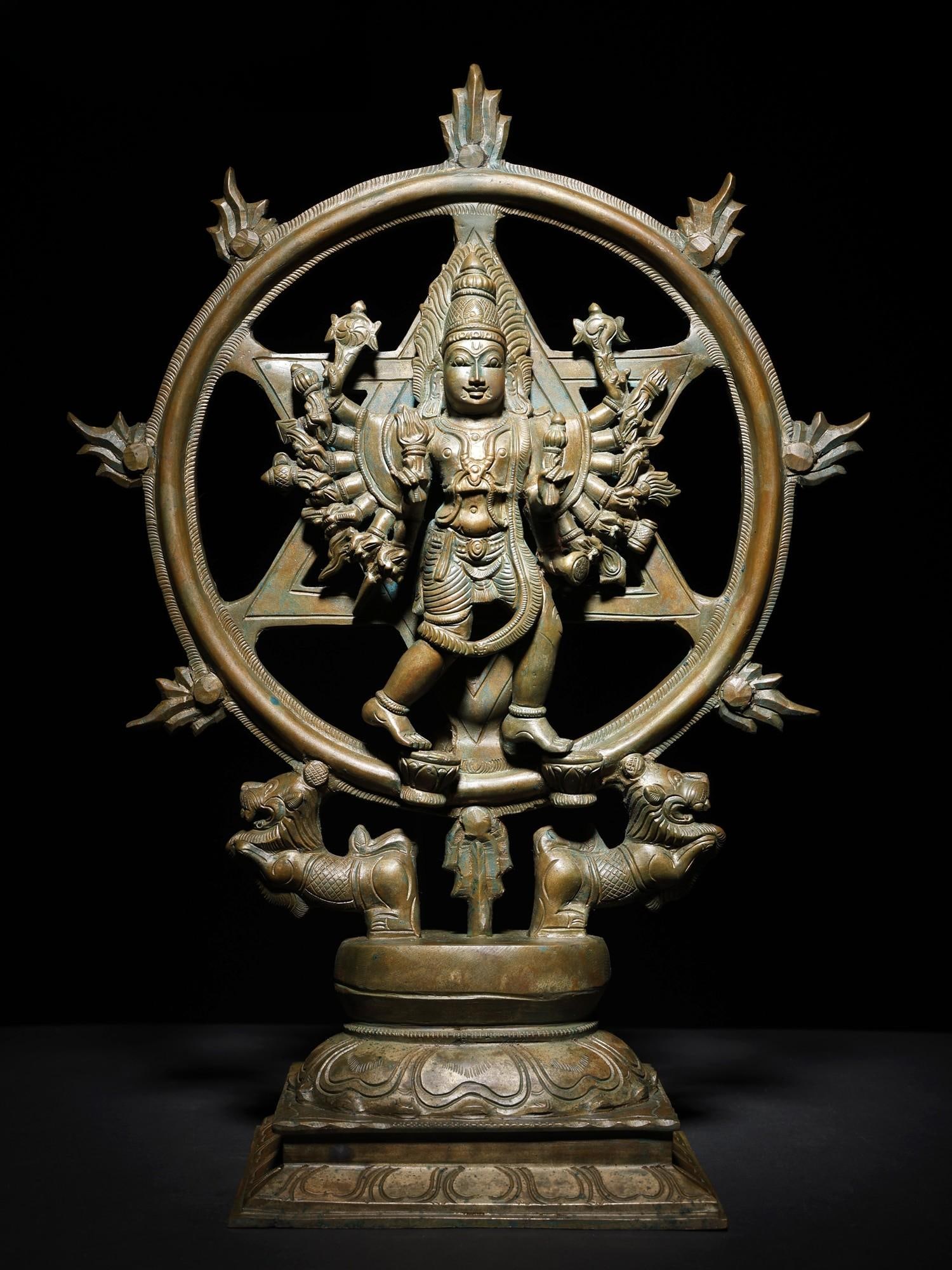 16" Chakrathalwar (Sudarshan Vishnu with Yoga Narasimha on Reverse) | Bronze Statue: Title: 16" Chakrathalwar (Sudarshan Vishnu with Yoga Narasimha on Reverse) | Bronze Statue Description: This unique bronze icon features the potent duo of Chakrathalwar or Sudarshan in an anthropomorp