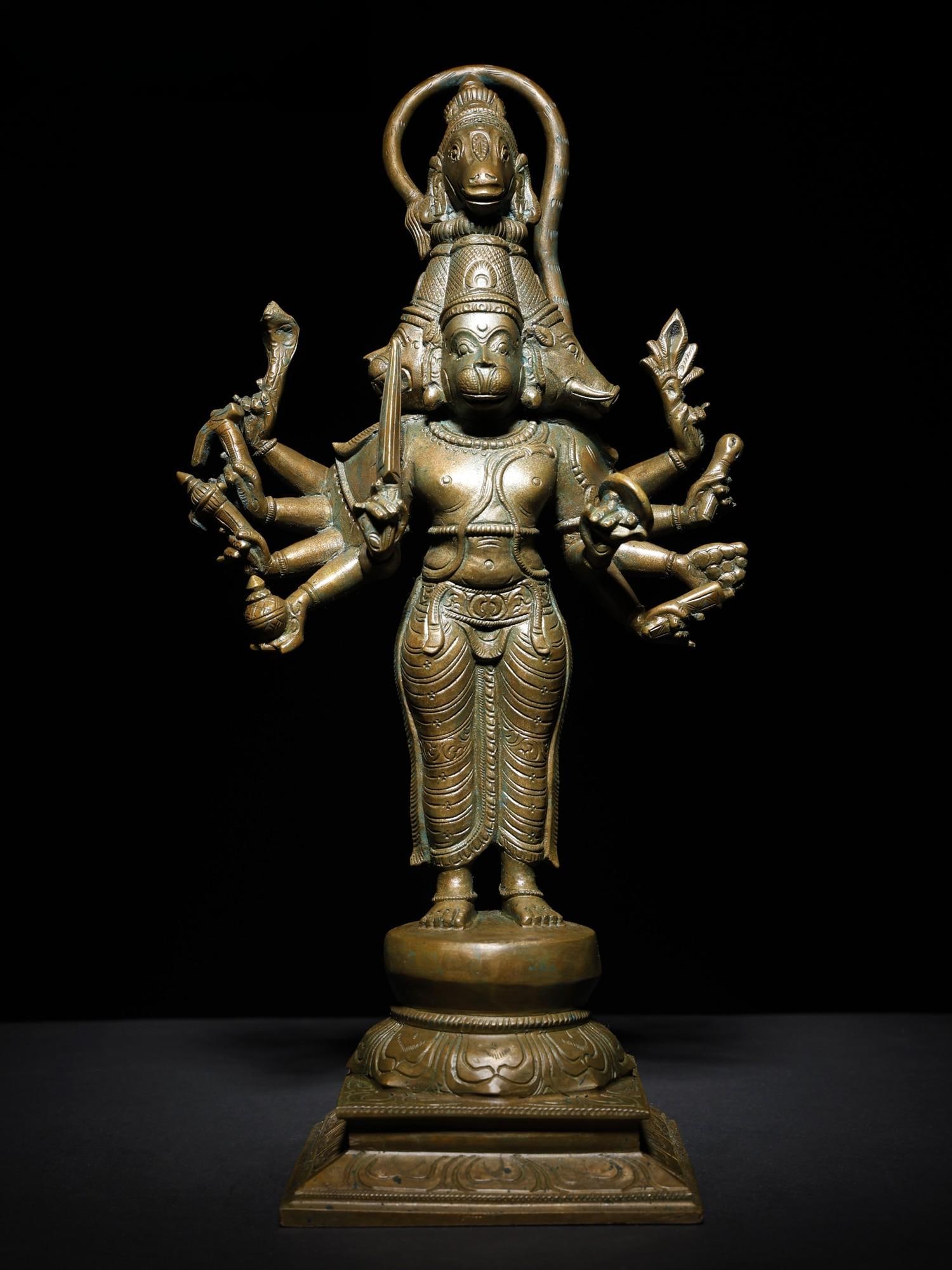 14" Ten Armed Standing Panchmukhi Hanuman Bronze Statue: Title: 14" Ten Armed Standing Panchmukhi Hanuman Bronze Statue Description: According to the legends of the Panchmukhi Anjaneya Temple in Karnataka, to bless Raghavendra Swamy, Hanuman appeared in a d