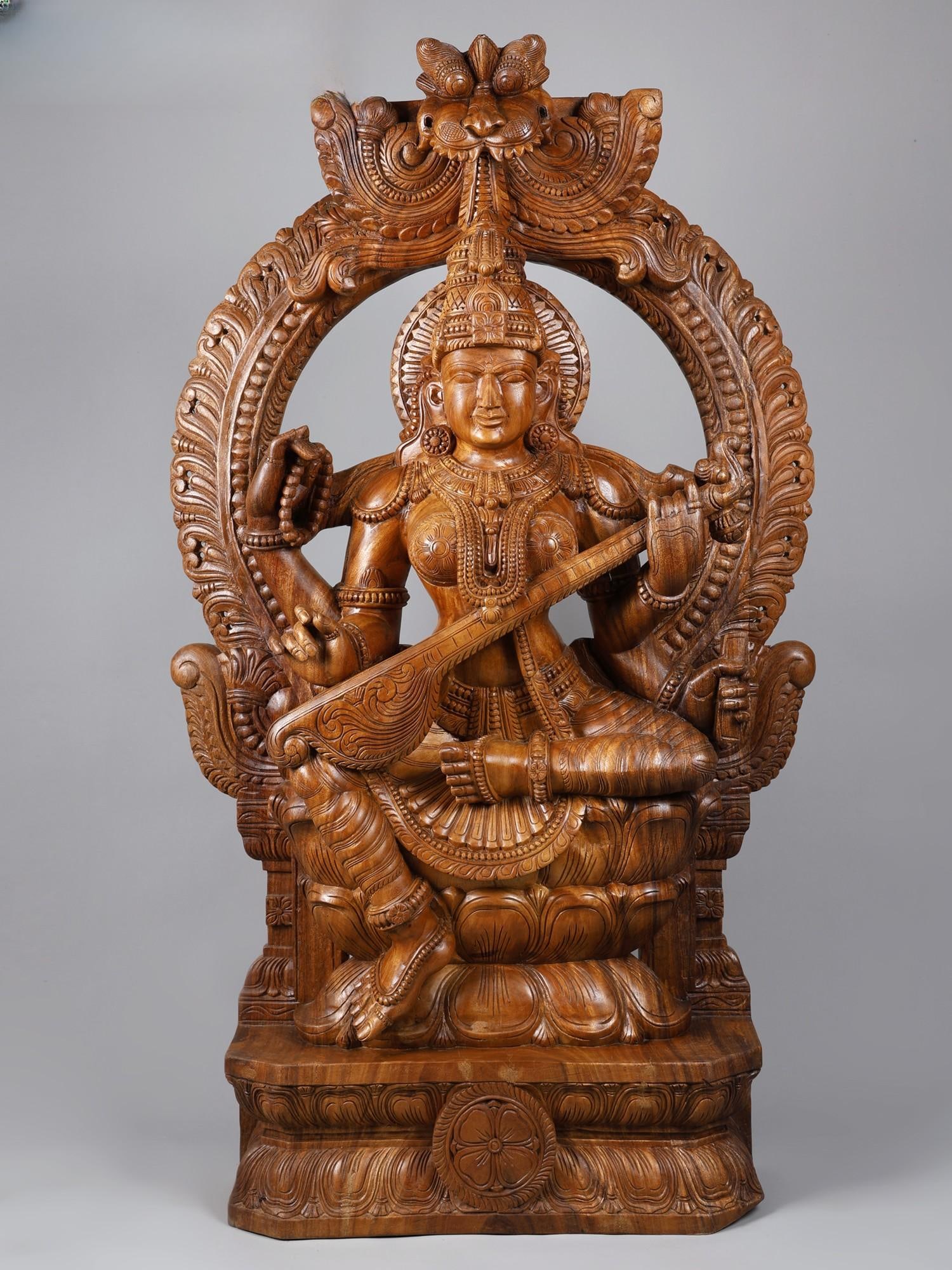 60" Large Four Armed Goddess Saraswati Seated on Kirtimukha Throne | Fine Quality Wood Carved Statue: Title: 60" Large Four Armed Goddess Saraswati Seated on Kirtimukha Throne | Fine Quality Wood Carved Statue Description: Additional Information: Hindu Gods & Goddesses Statues Reserve: $3,307.00 Shipp