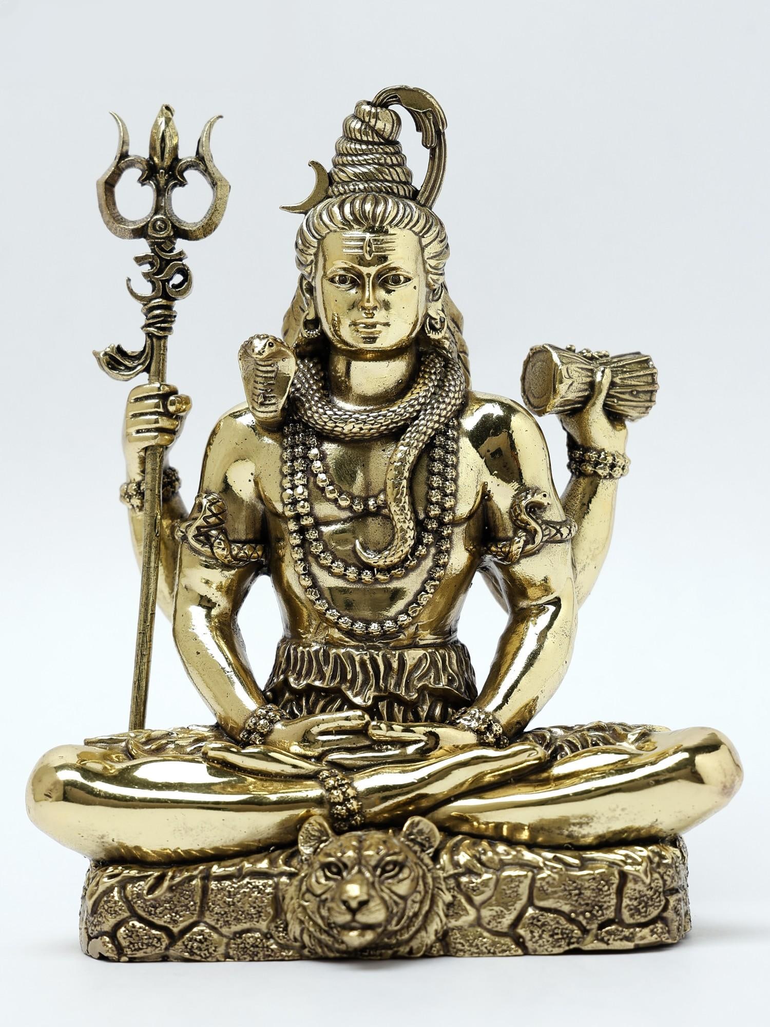Superfine Sitting Lord Shiva Brass Statue | Different Sizes: Title: Superfine Sitting Lord Shiva Brass Statue | Different Sizes Description: This Superfine Sitting Lord Shiva Brass Statue portrays the divine deity in his Chaturbhuj form, representing his omnipr