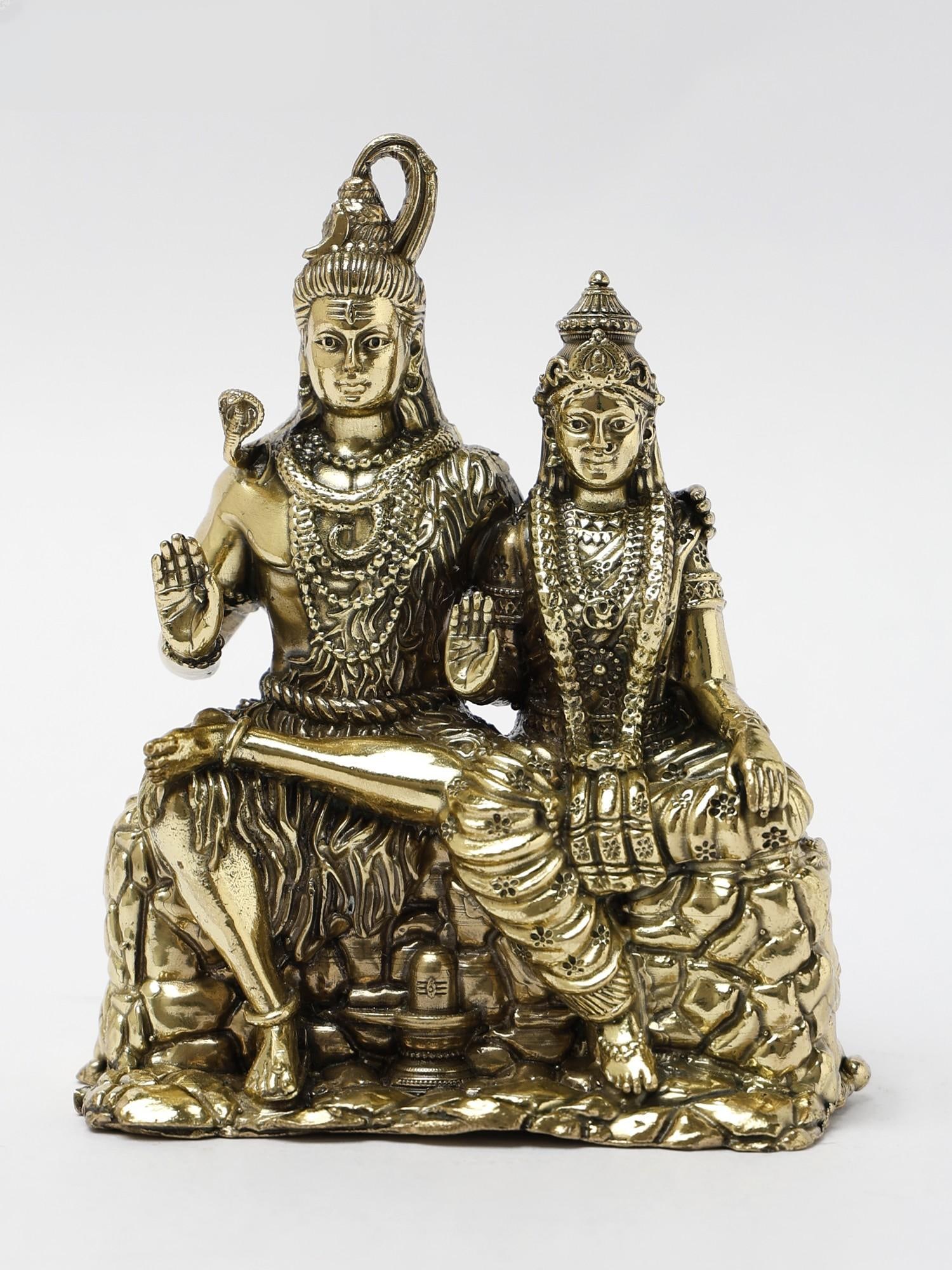 Small Superfine Shiva Parvati Brass Statue Seated in Blessing Gesture | Multiple Sizes: Title: Small Superfine Shiva Parvati Brass Statue Seated in Blessing Gesture | Multiple Sizes Description: The brass statue of Small Shiva-Parvati Seated in a Blessing Gesture is a divine