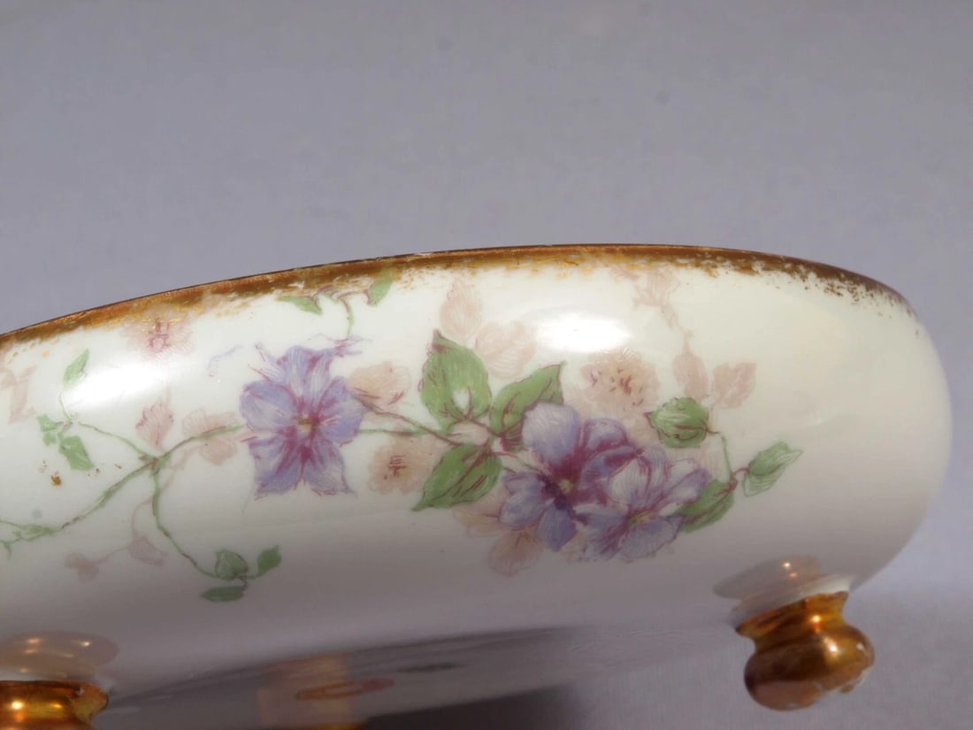 Limoges CHField Haviland GDA France Tray Platter Nut Bonbon Dish Purple Flowers: This is a vintage footed Serving Tray/Dish. It is made in CH Field GDA Haviland in Limoges, France. The dish is 5 1/2" in diameter and 2" tall. It is in good used antique condition with no crazing. Th
