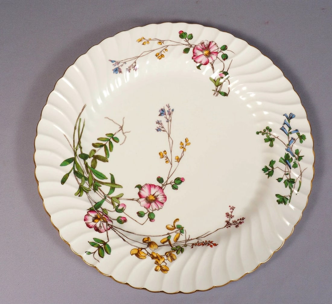 Minton Dainty Sprays S-511 Large Cake Chop Plate Platter England: This is a Chop Plate/Platter made by Minton in England. The plate is in Dainty Sprays Pattern - S-511 It has pink, yellow and blue flowers and swill rim This is very rare piece and very hard to find.